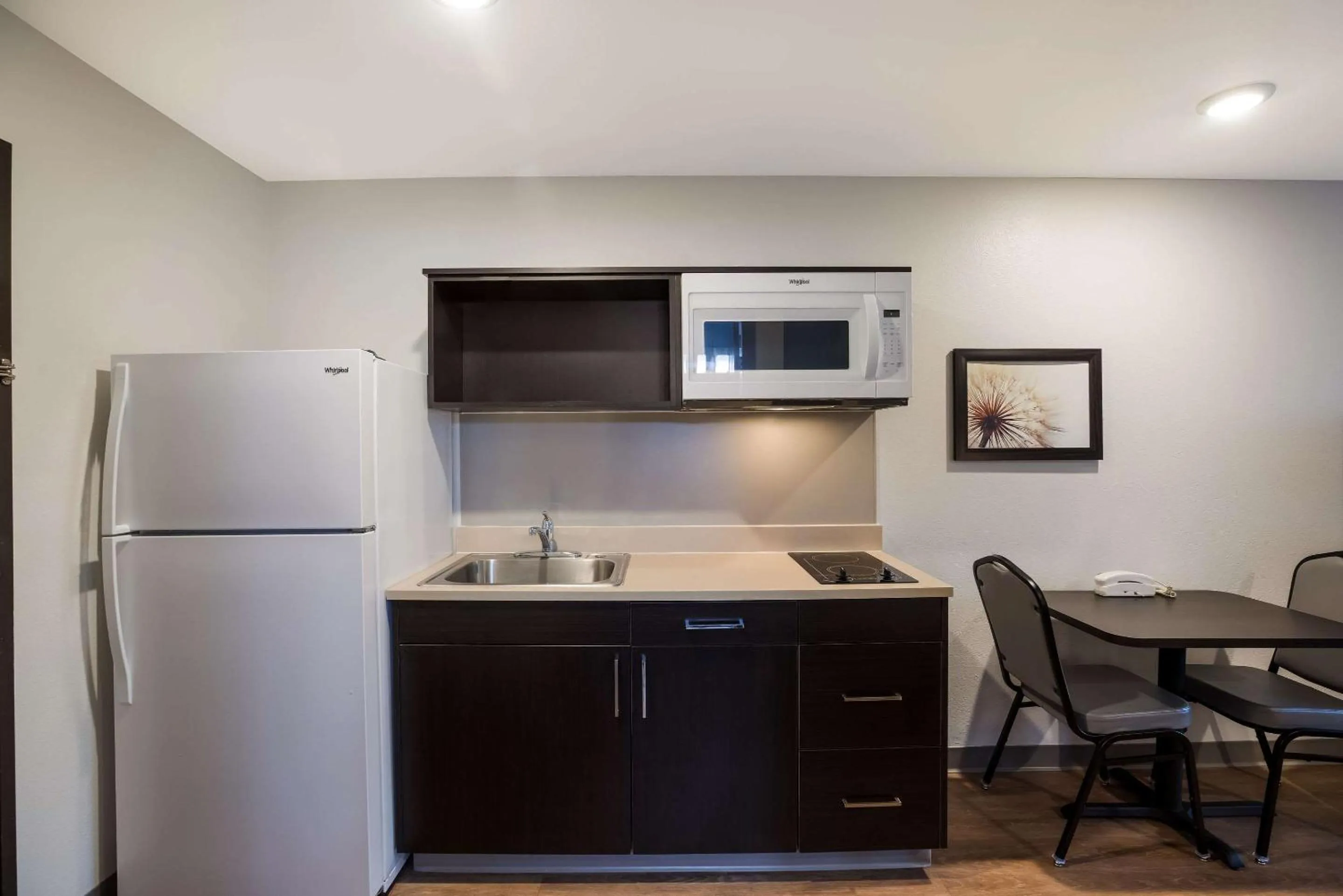 Bedroom in WoodSpring Suites Orlando North - Maitland