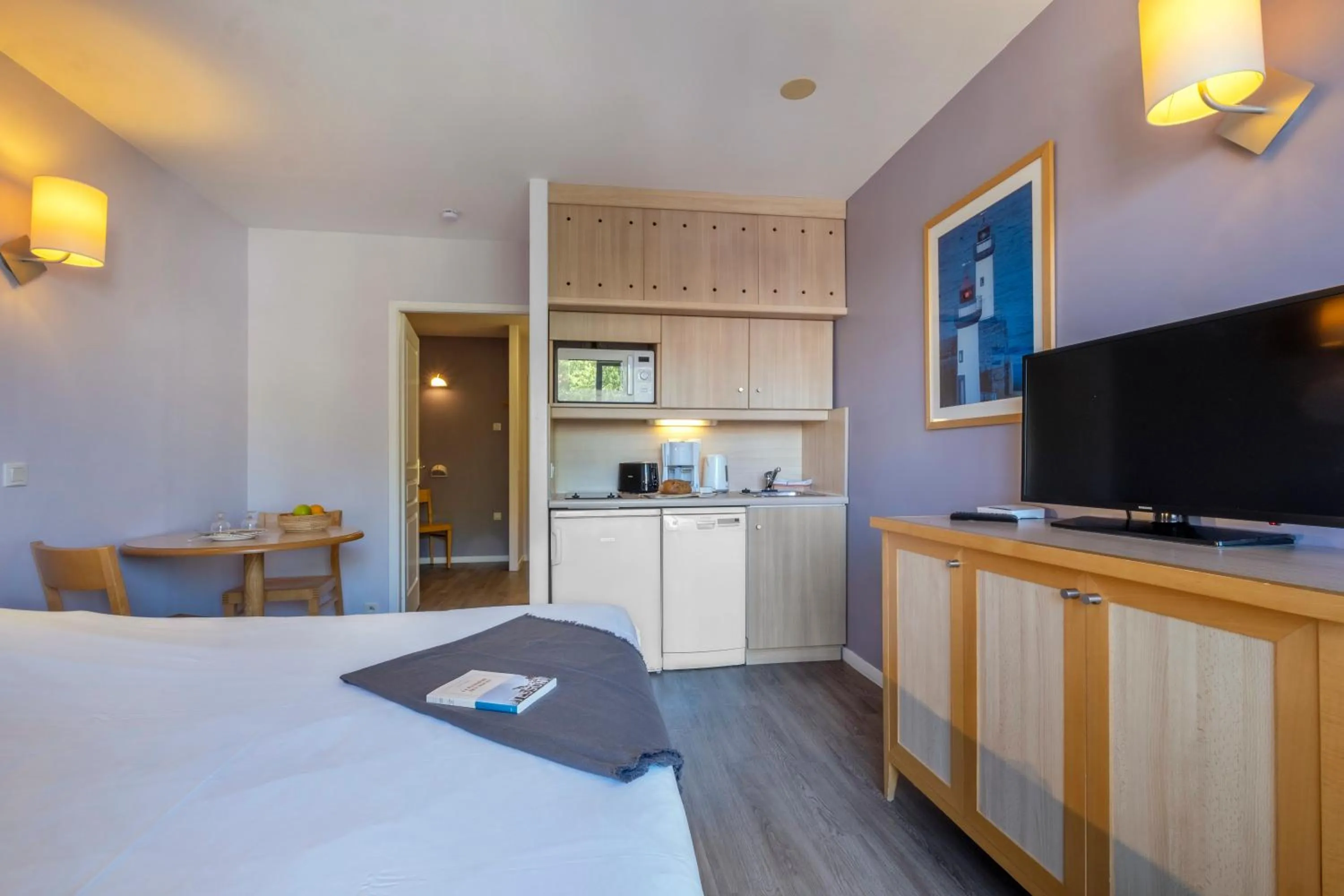 Communal lounge/ TV room, Bed in Résidence Pierre & Vacances Centre