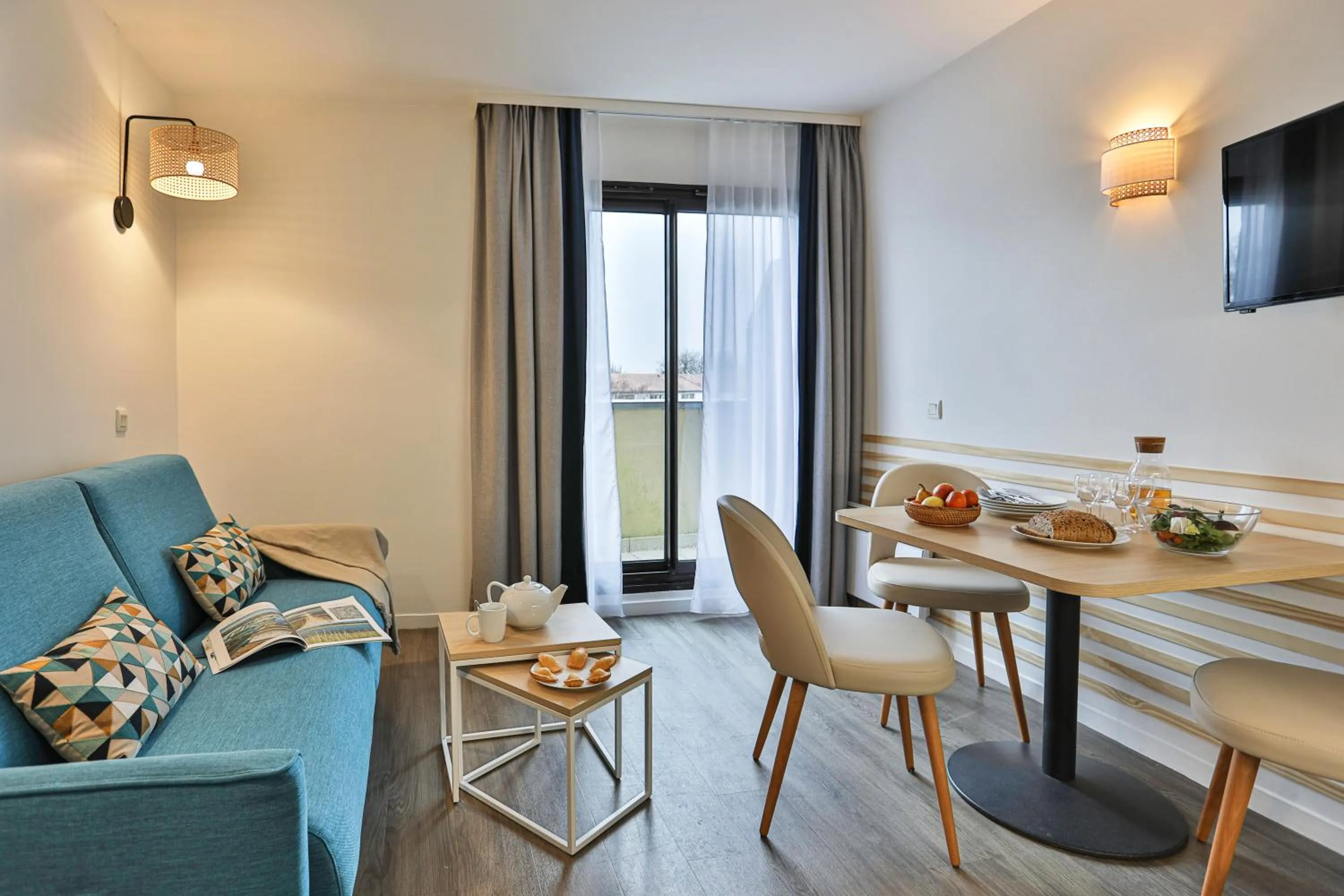 Communal lounge/ TV room in Résidence Pierre & Vacances Centre