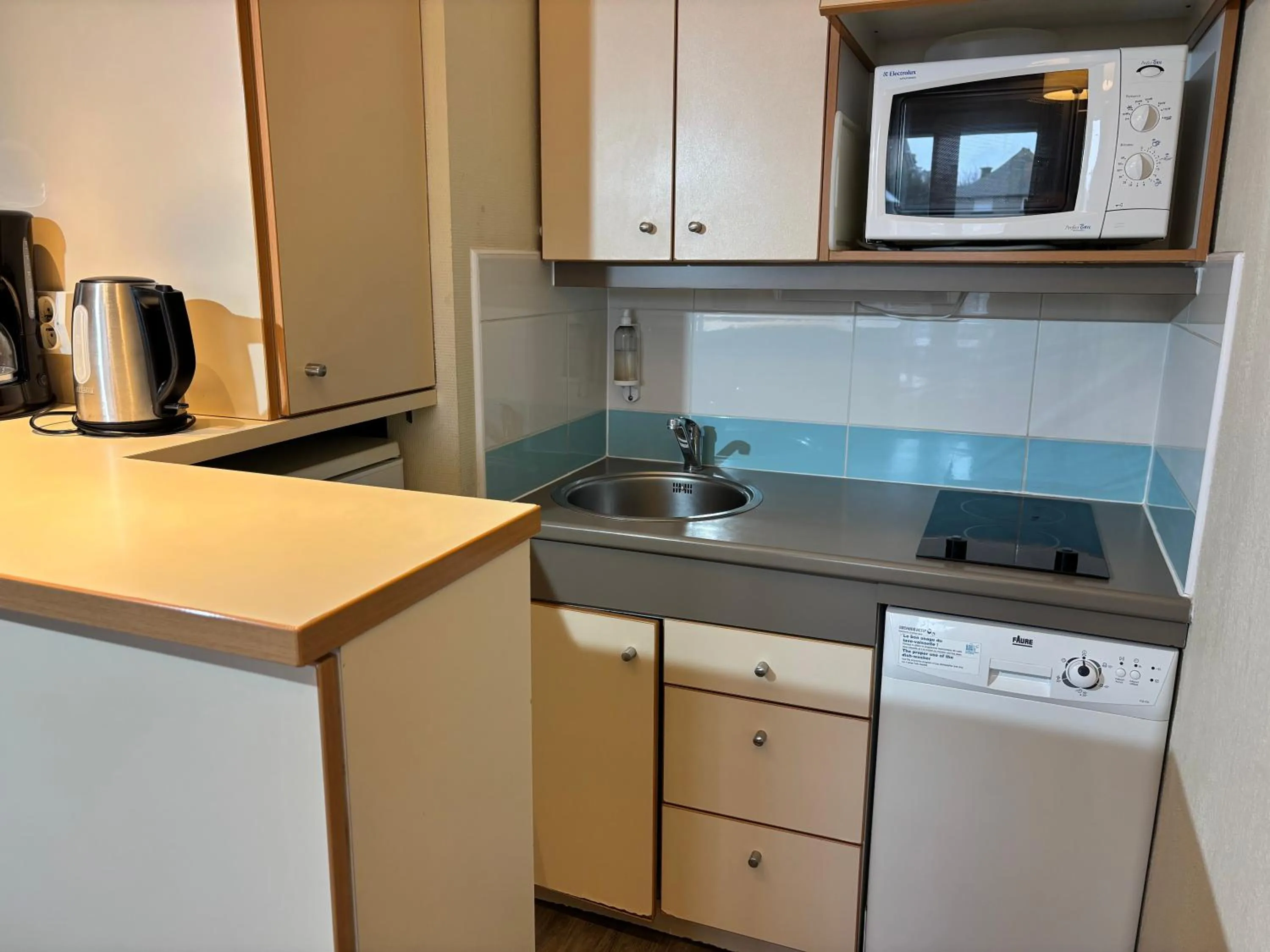 Kitchen or kitchenette in Résidence Pierre & Vacances Ty Mat