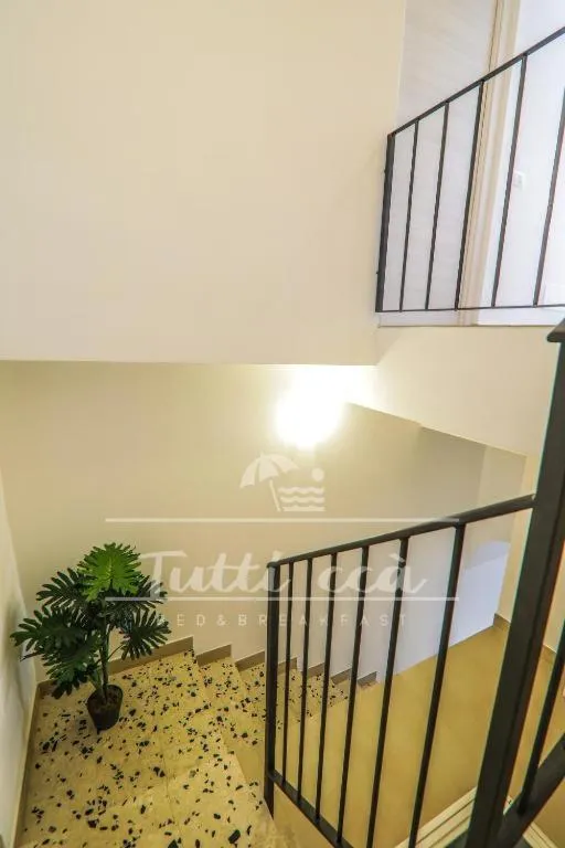 Bed in Tutti ccà Airport Rooms