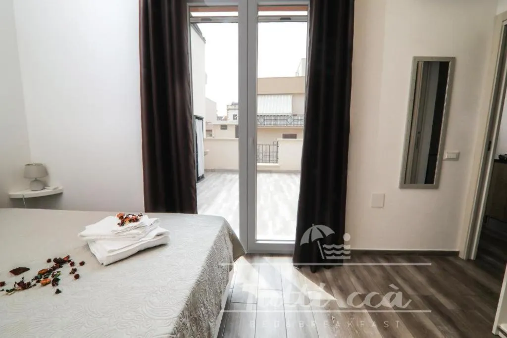 Bed in Tutti ccà Airport Rooms