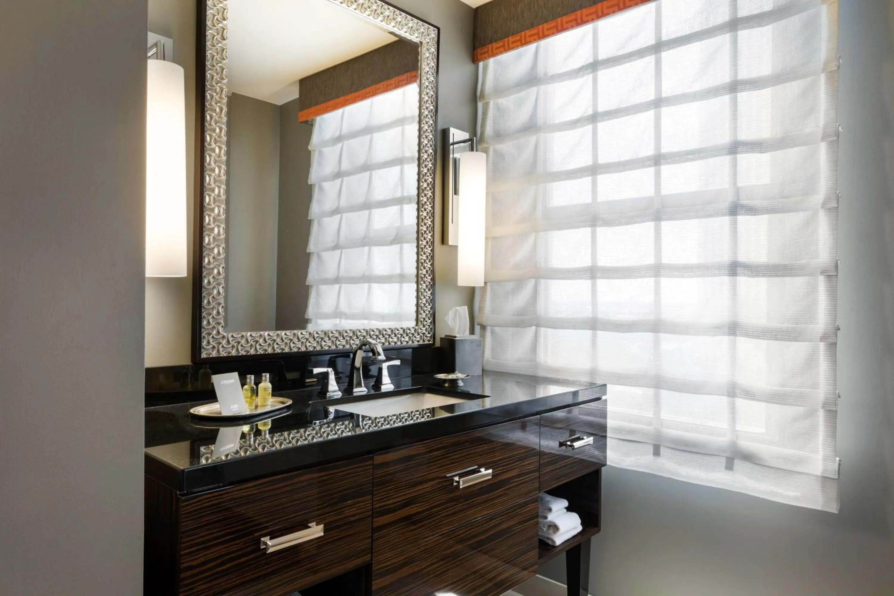 Bathroom in Colcord Hotel Oklahoma City, Curio Collection by Hilton