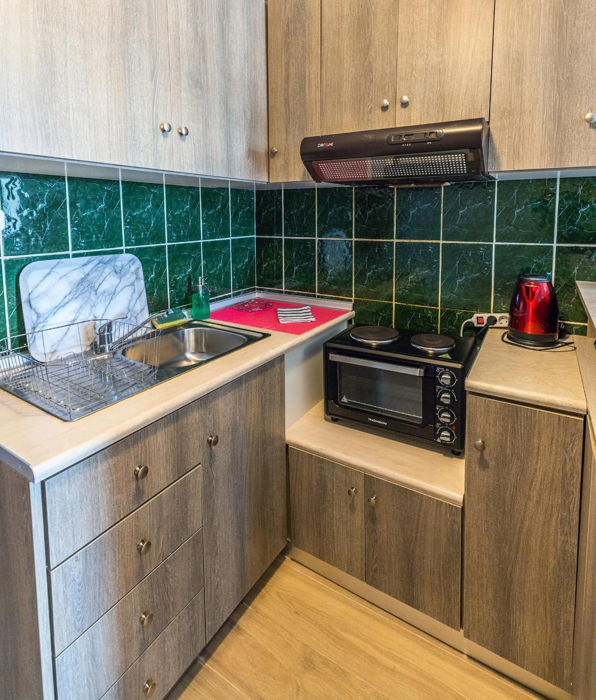 Kitchen or kitchenette in Rose Garden Apartments