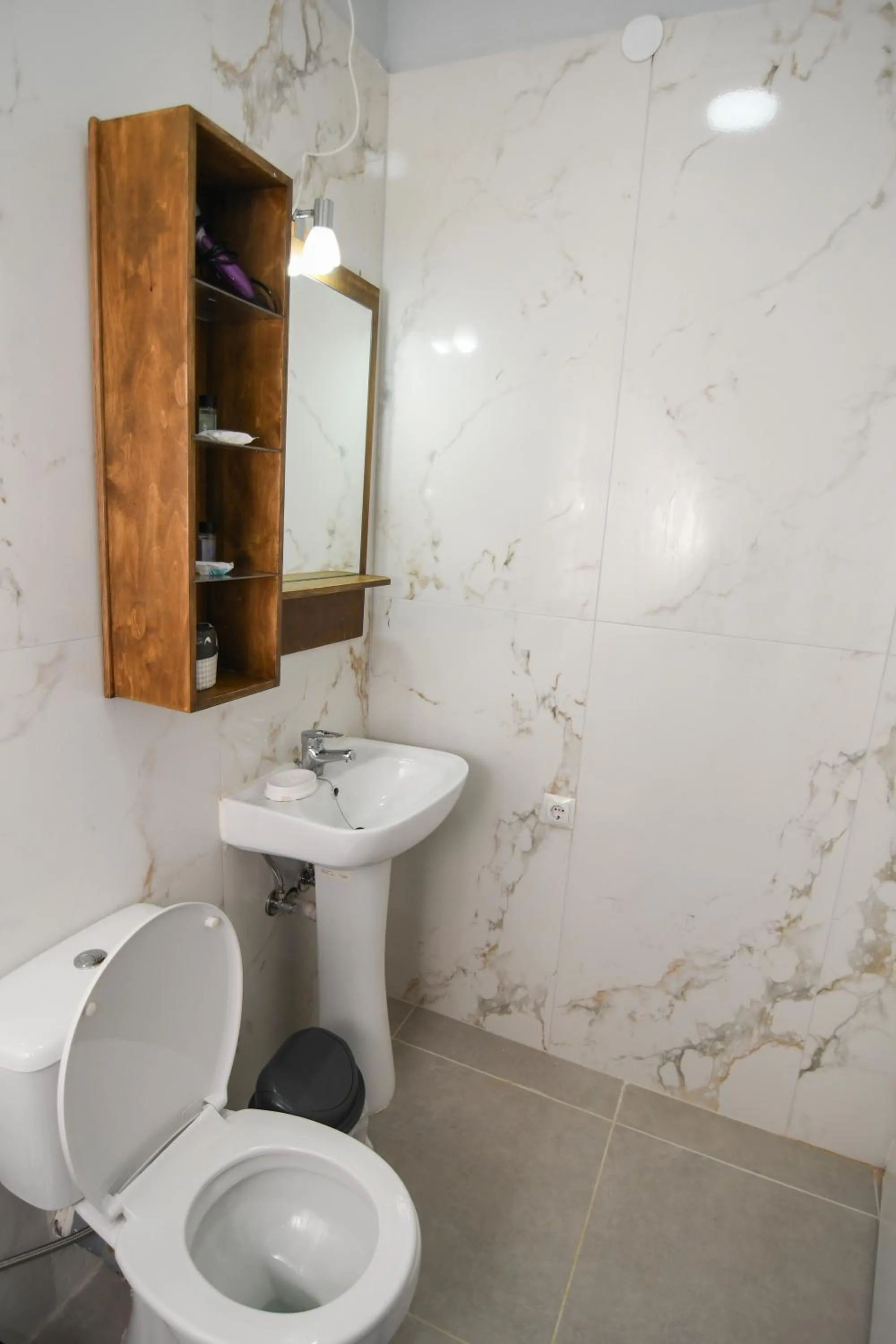 Toilet in Rose Garden Apartments