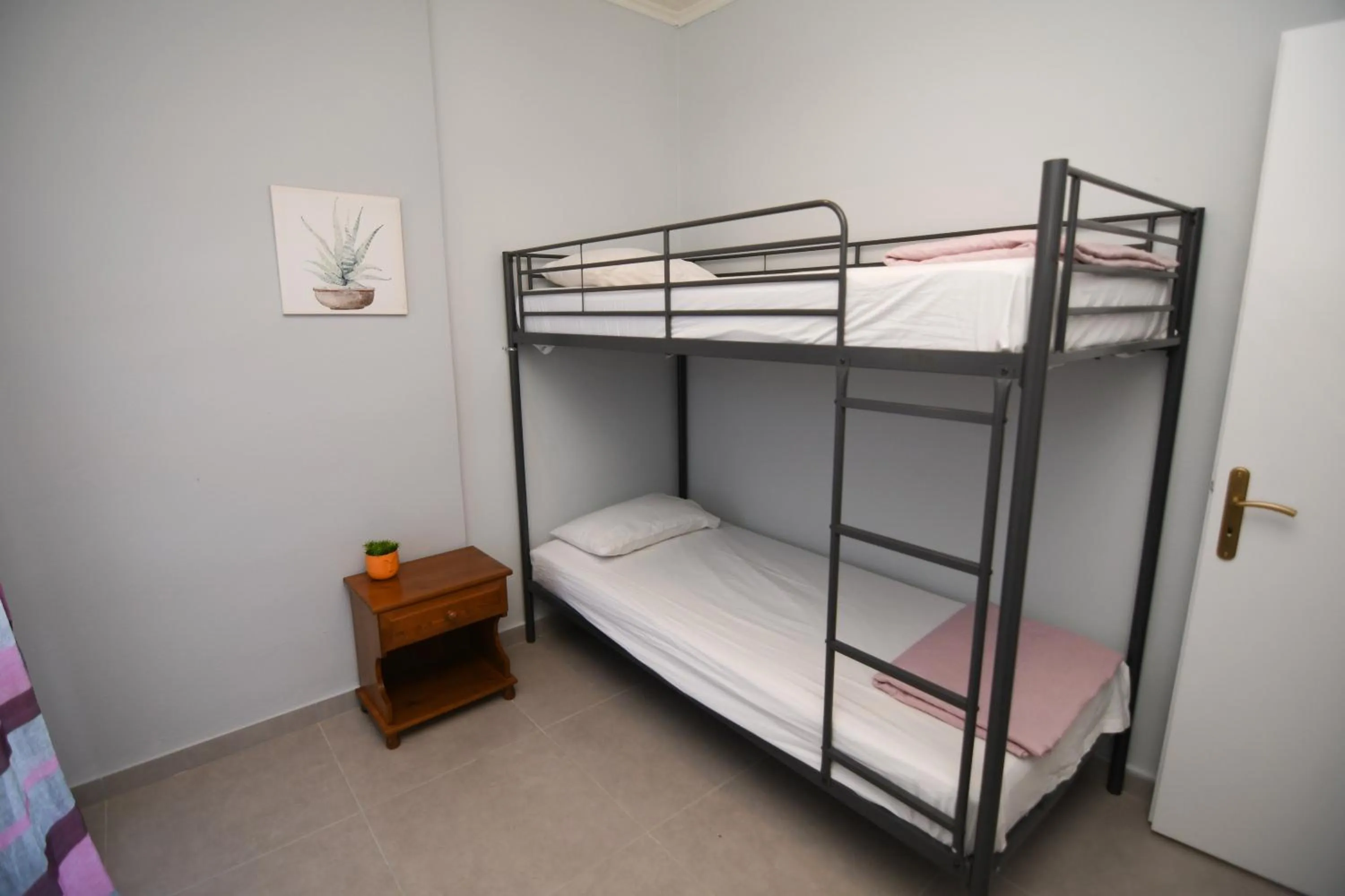 Bed in Rose Garden Apartments