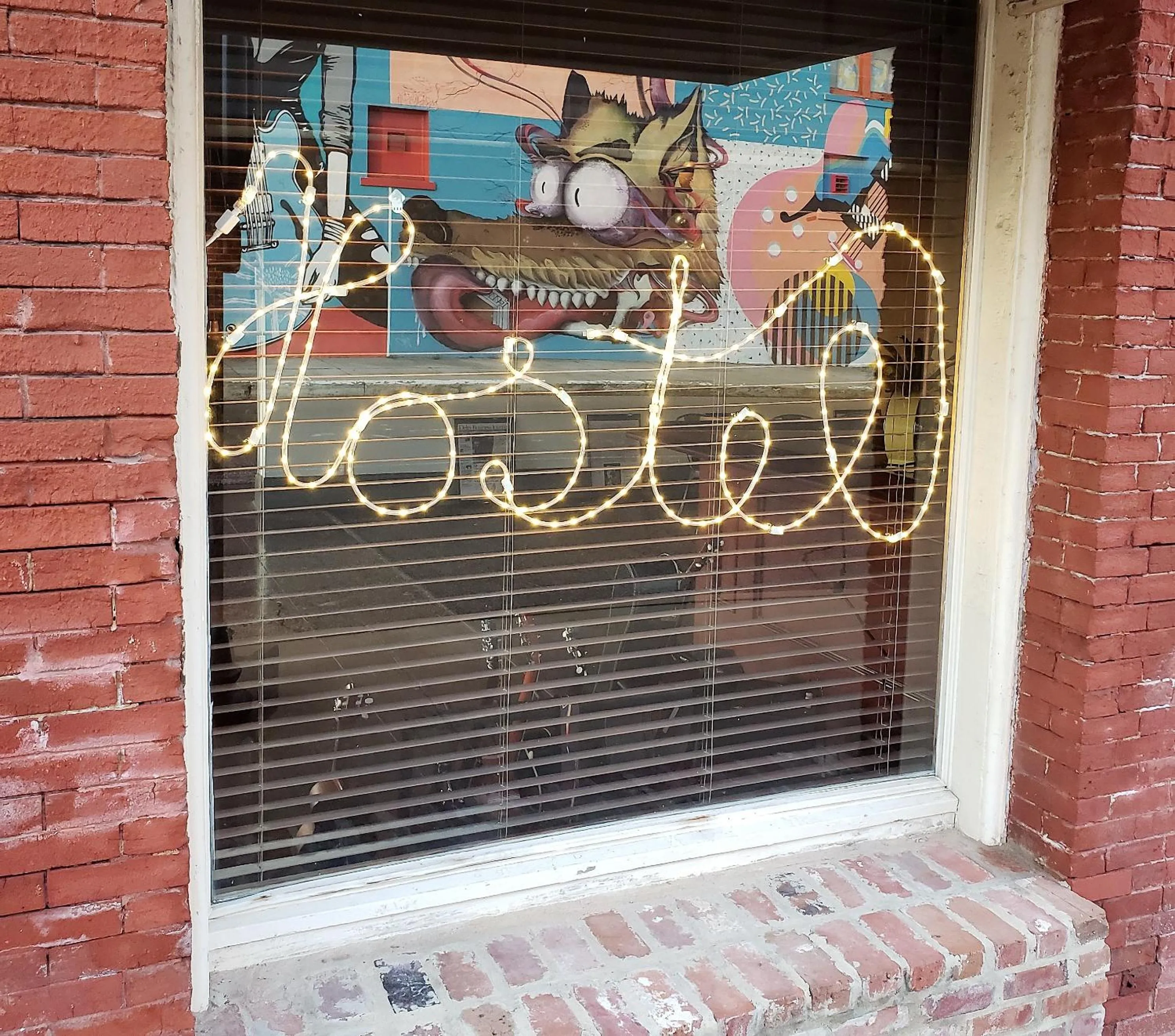 Property logo or sign in HOSTEL Auberge Clarksdale