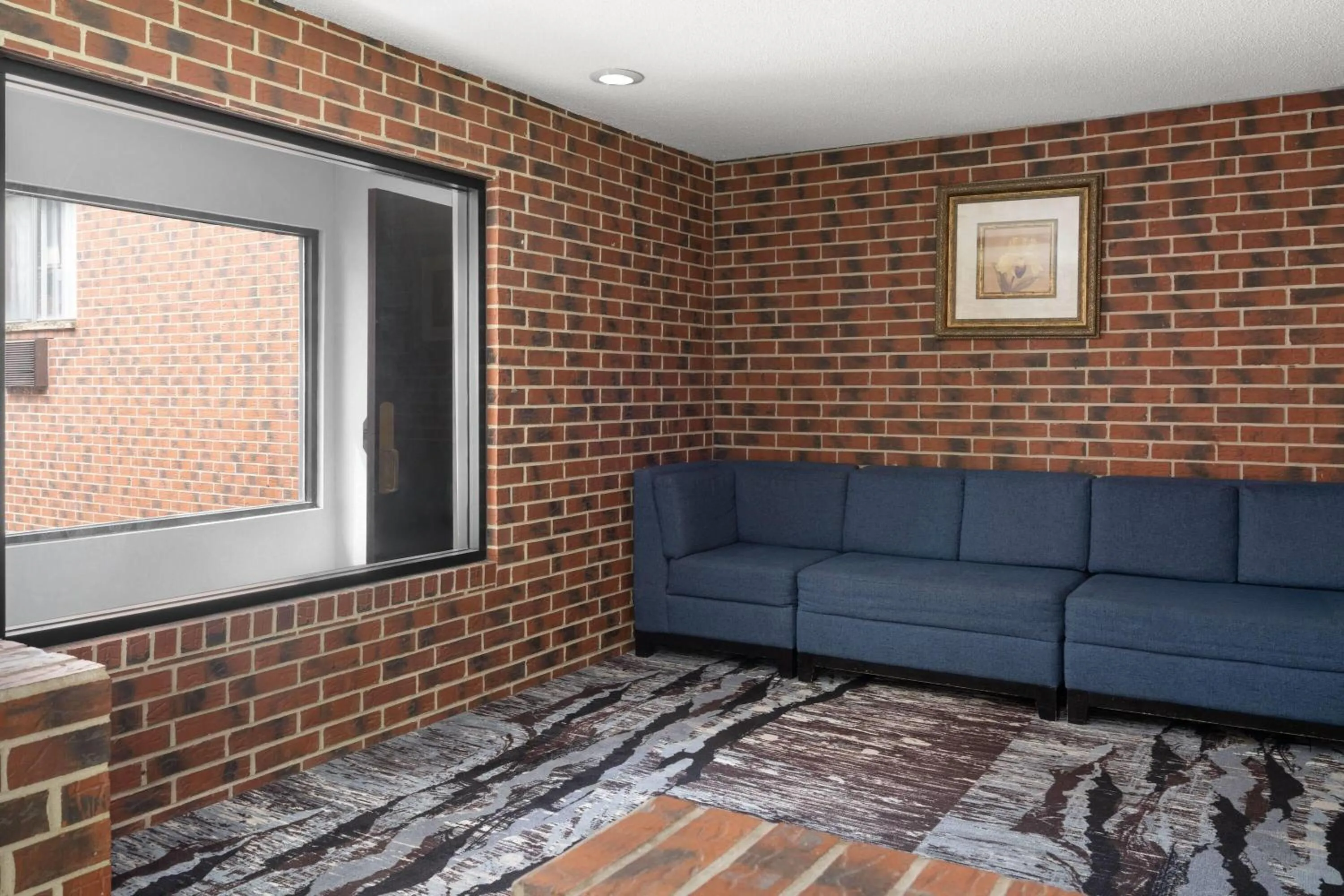 Lobby or reception in Ramada by Wyndham Cedar Rapids South