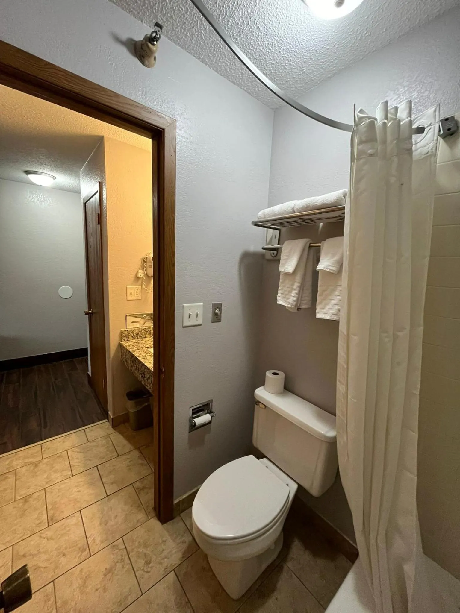 Bathroom in Ramada by Wyndham Cedar Rapids South