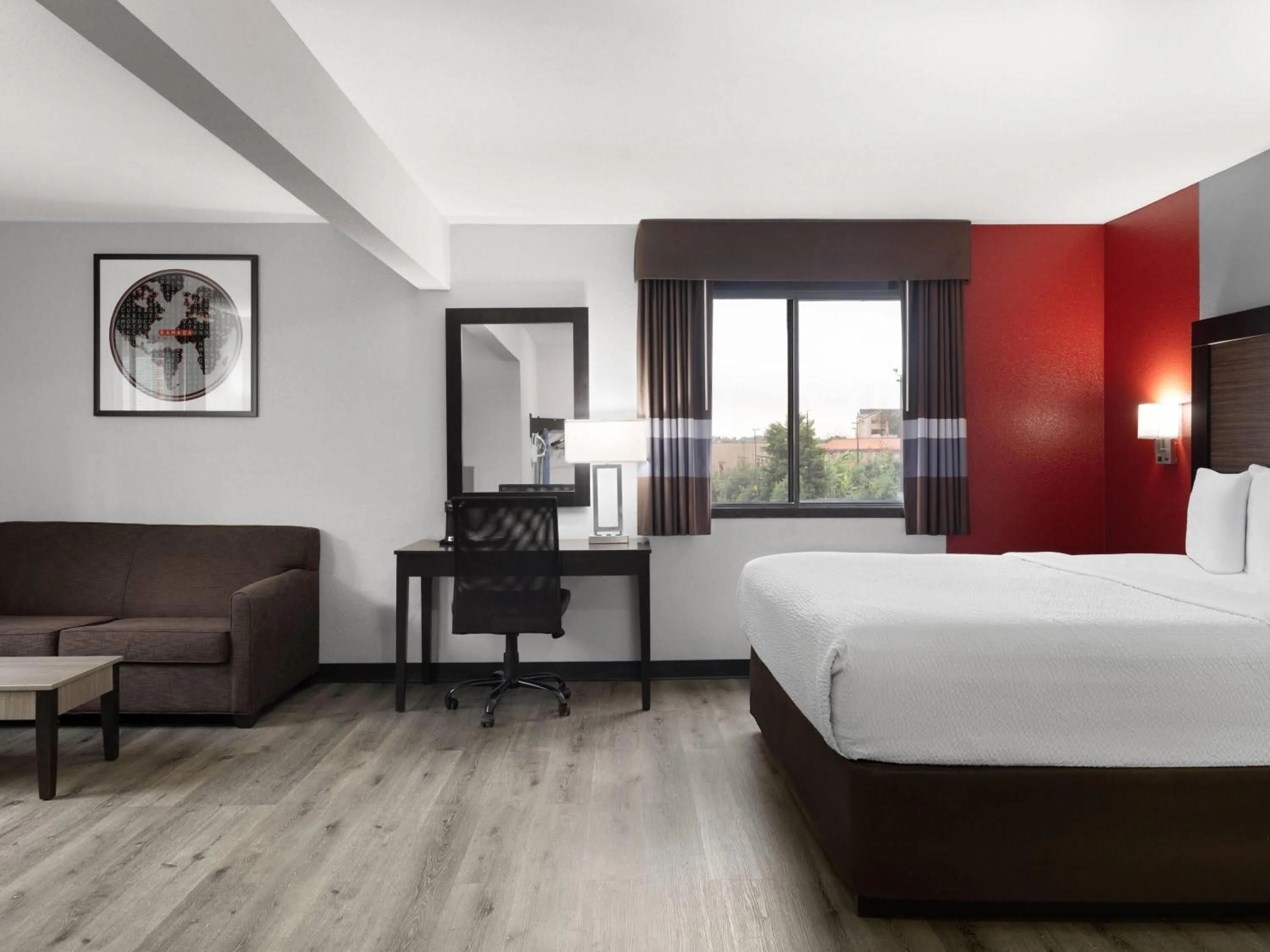 Photo of the whole room, Bed in Ramada by Wyndham Cedar Rapids South