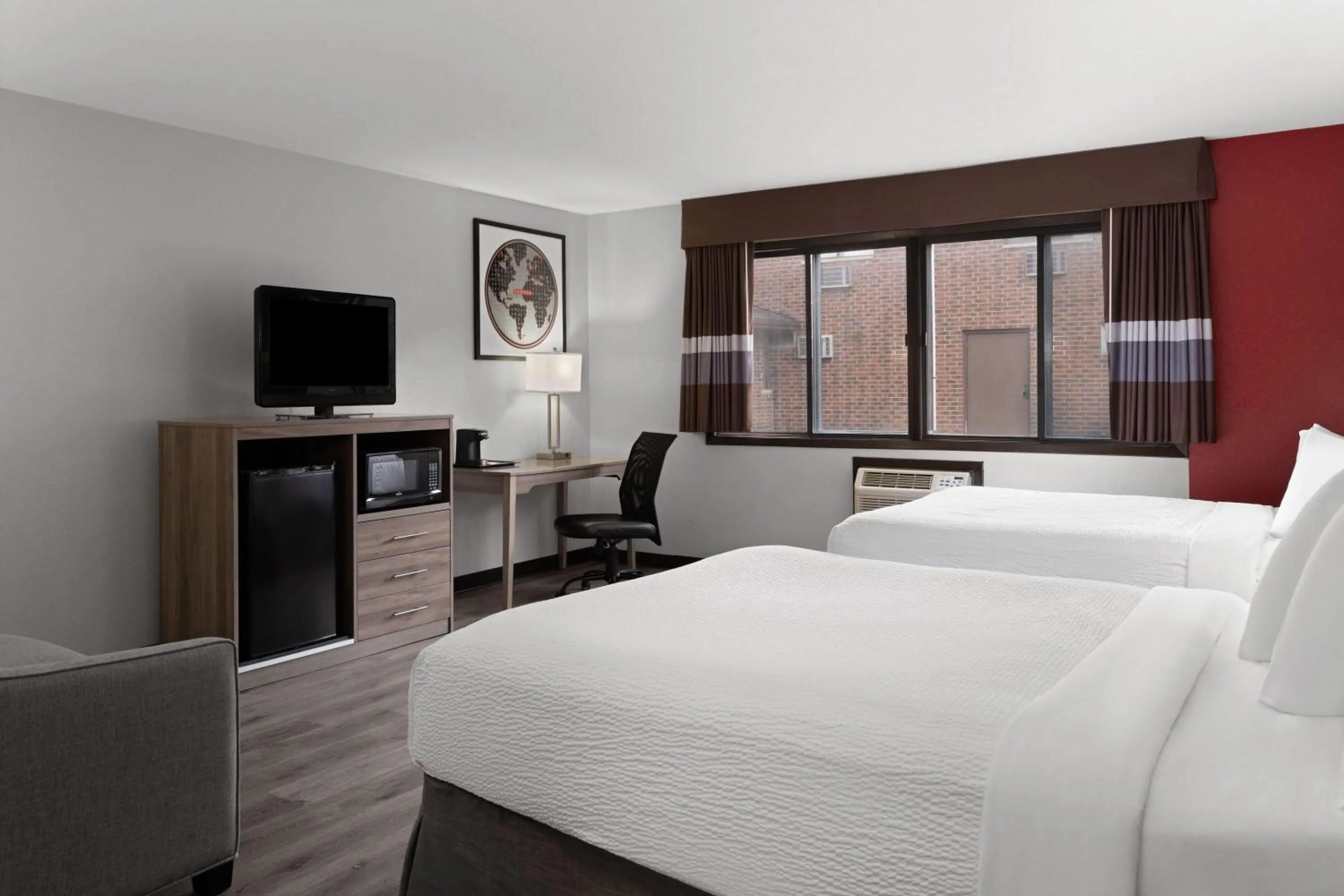 Photo of the whole room, Bed in Ramada by Wyndham Cedar Rapids South