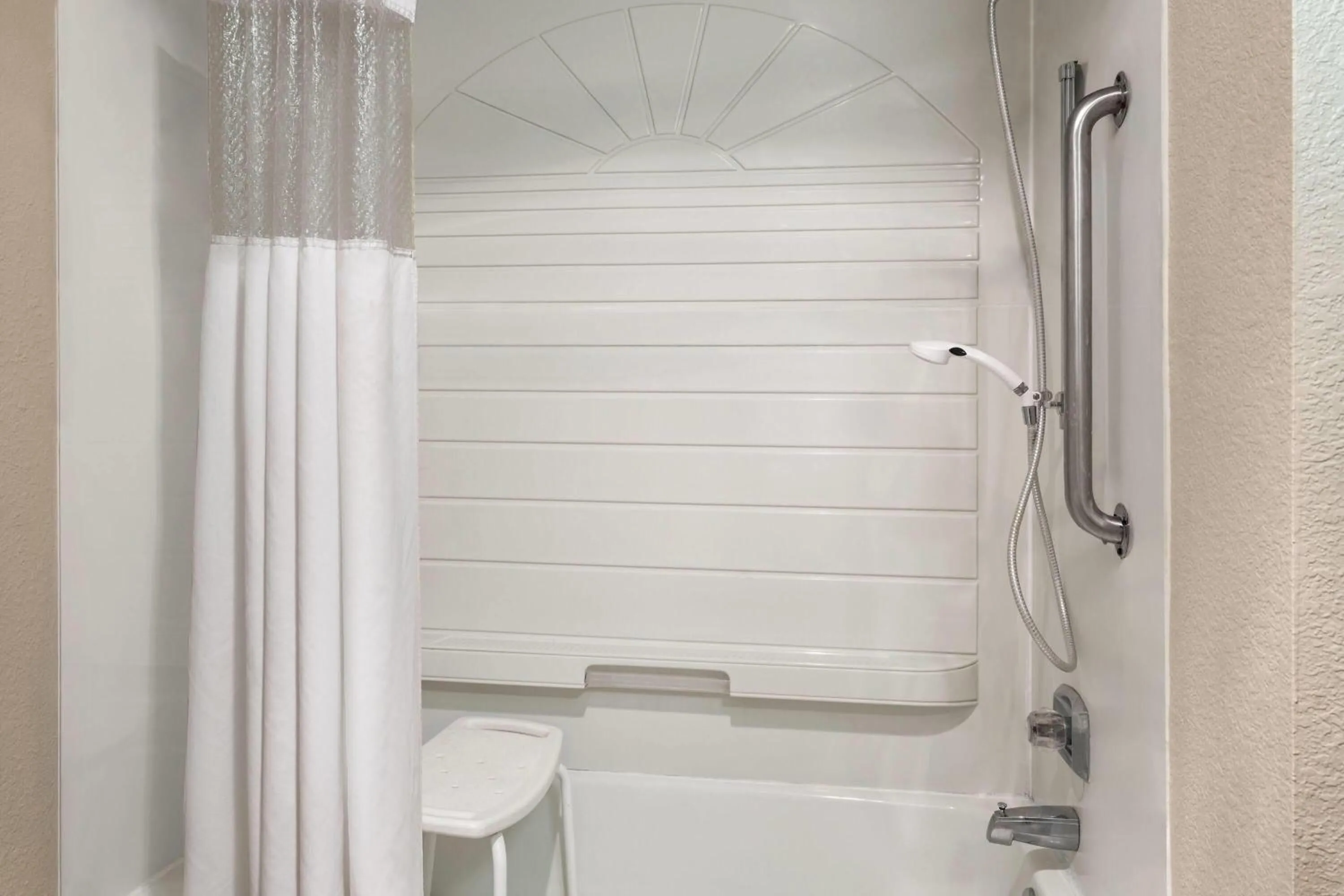 Bathroom in Ramada by Wyndham Cedar Rapids South