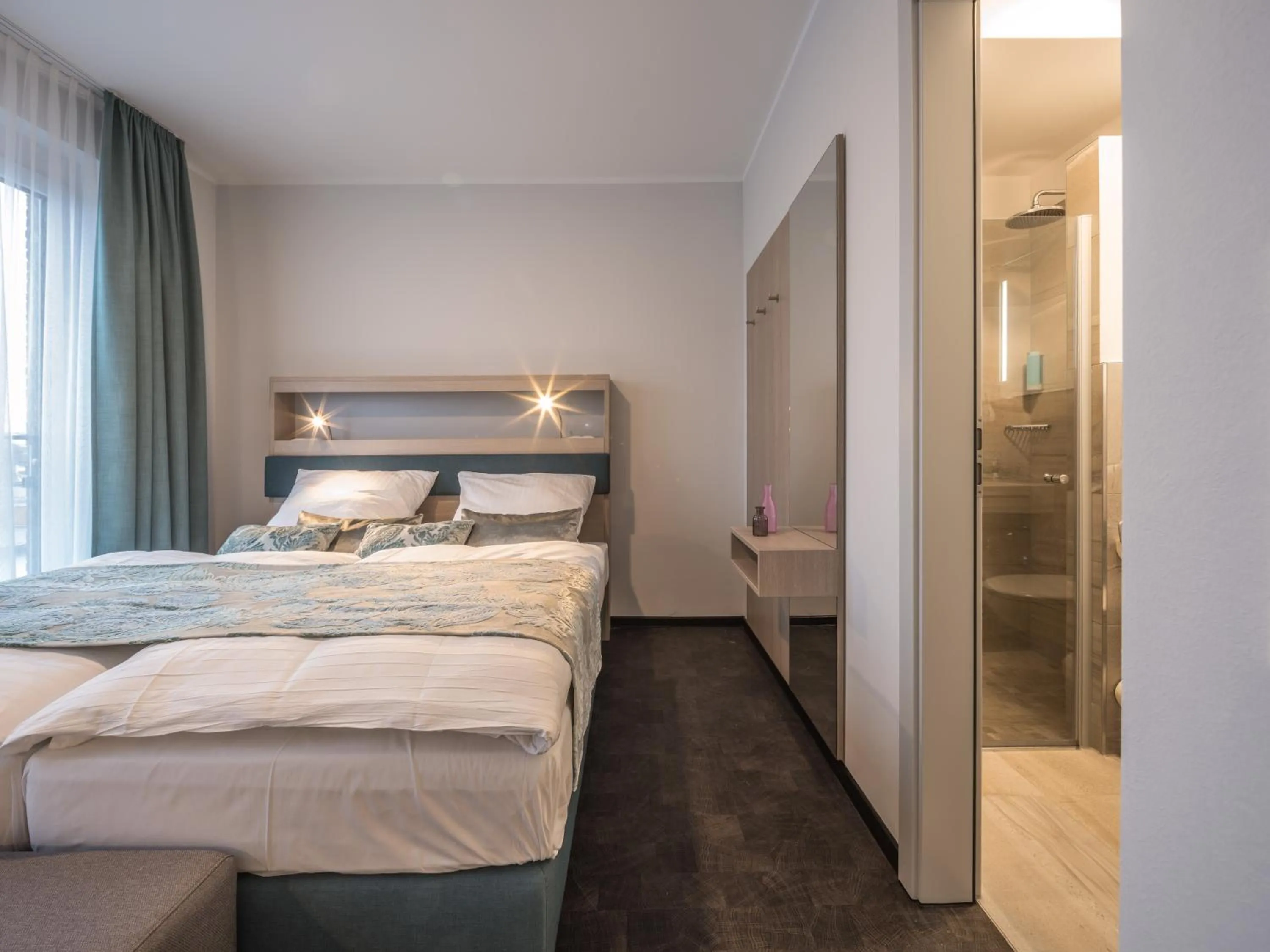 Bed in RS-HOTEL - smart & modern Hotel Apartments