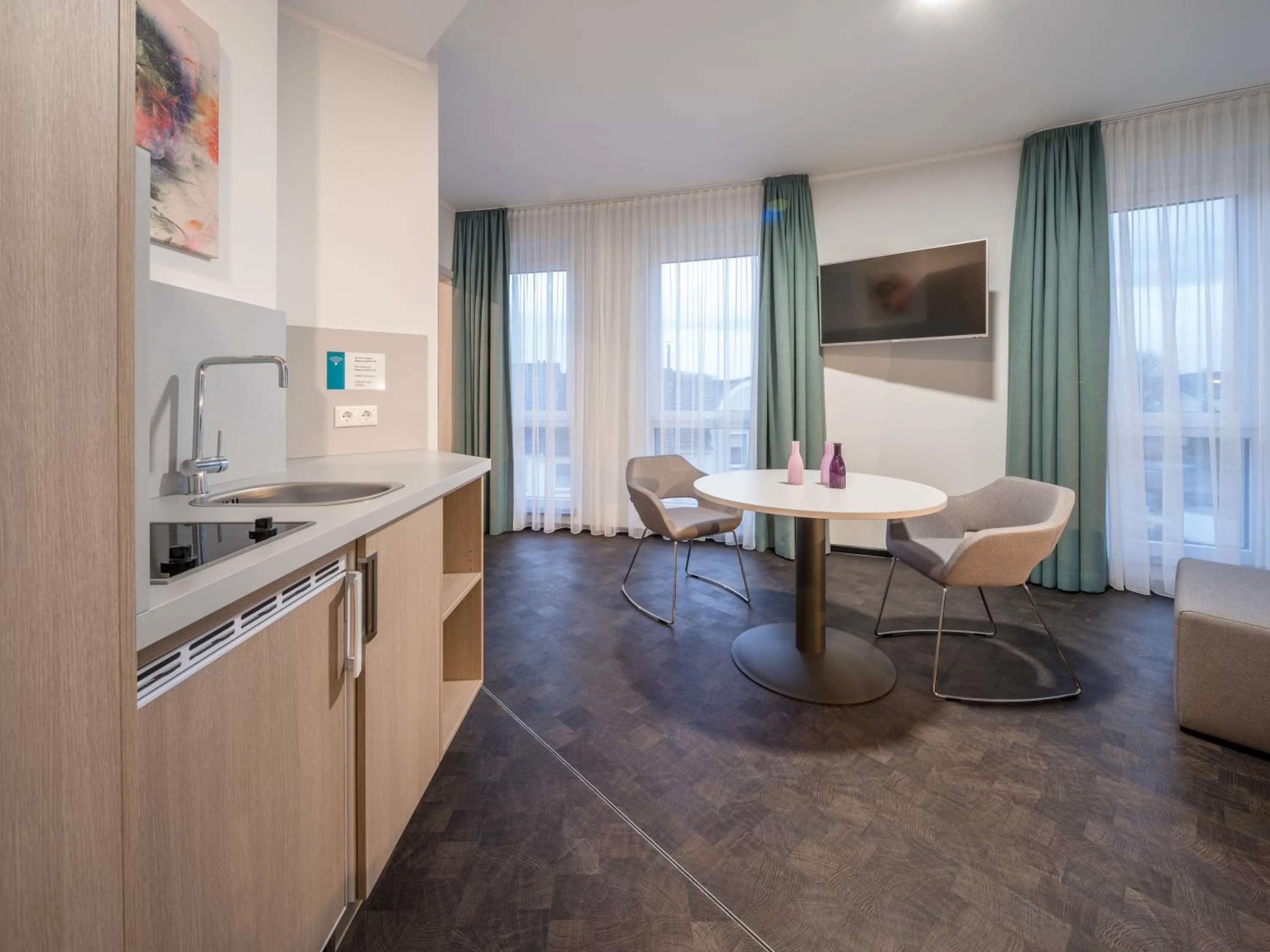 Kitchen or kitchenette in RS-HOTEL - smart & modern Hotel Apartments