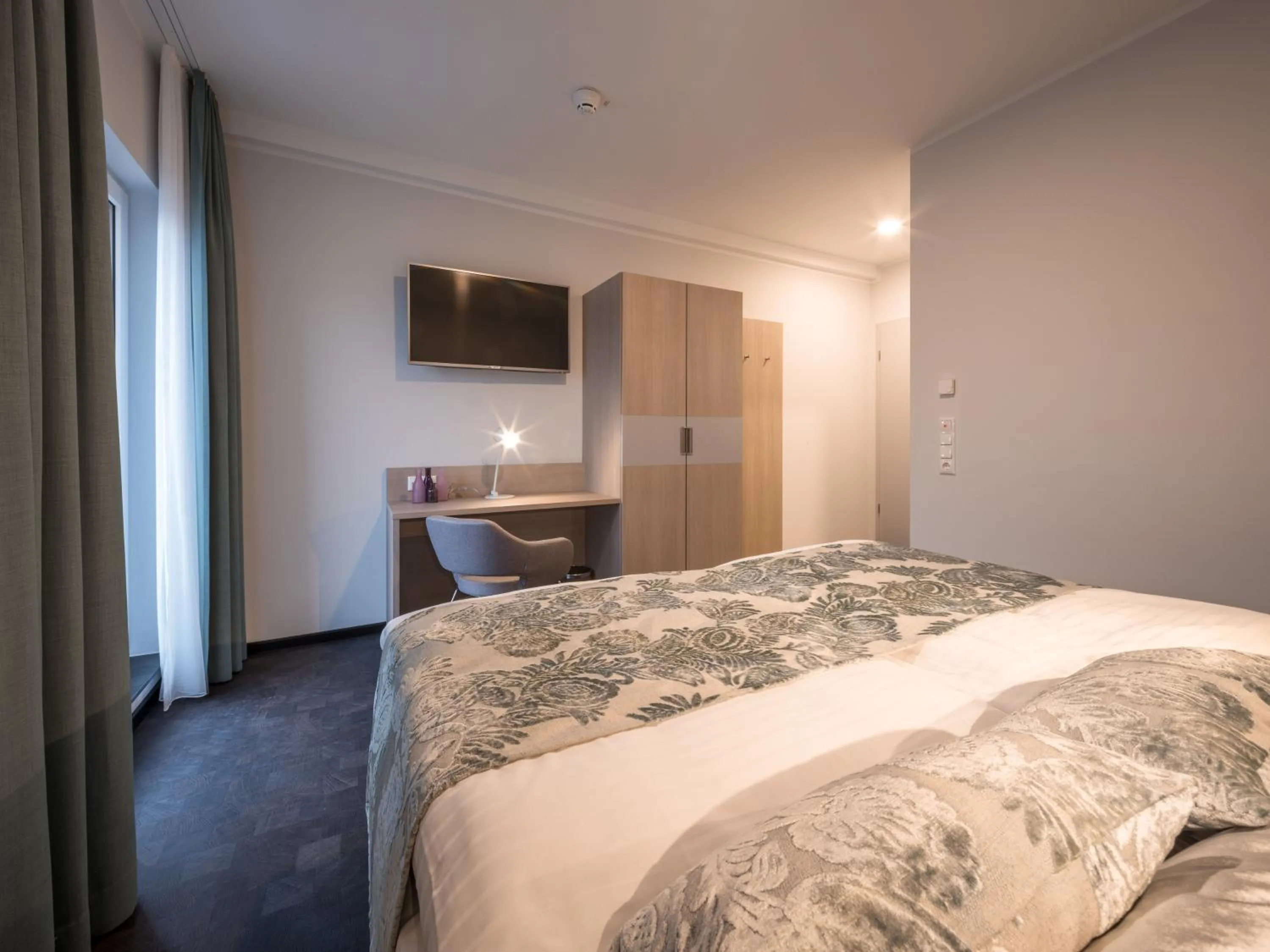 Bed in RS-HOTEL - smart & modern Hotel Apartments