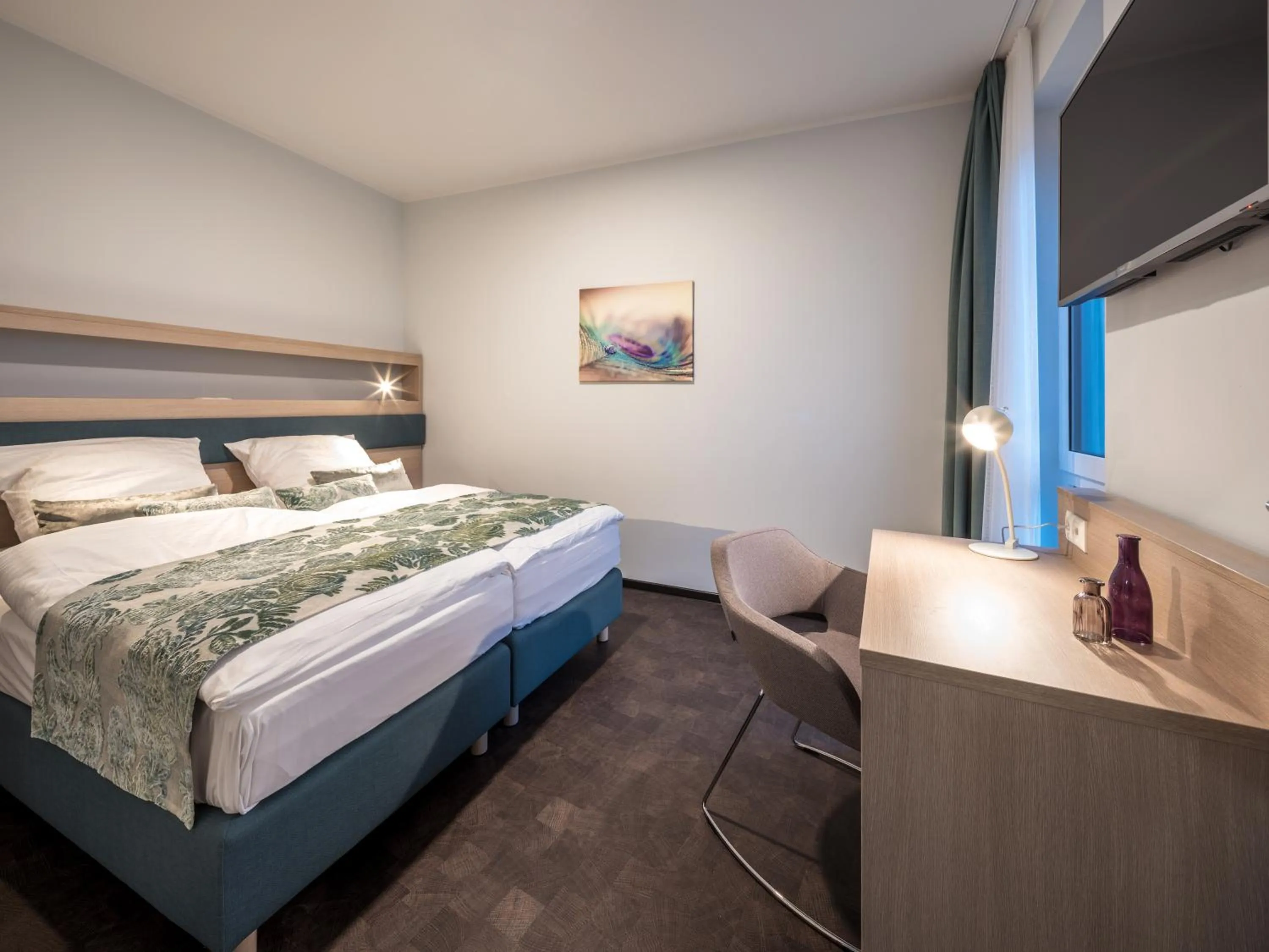 Bed in RS-HOTEL - smart & modern Hotel Apartments