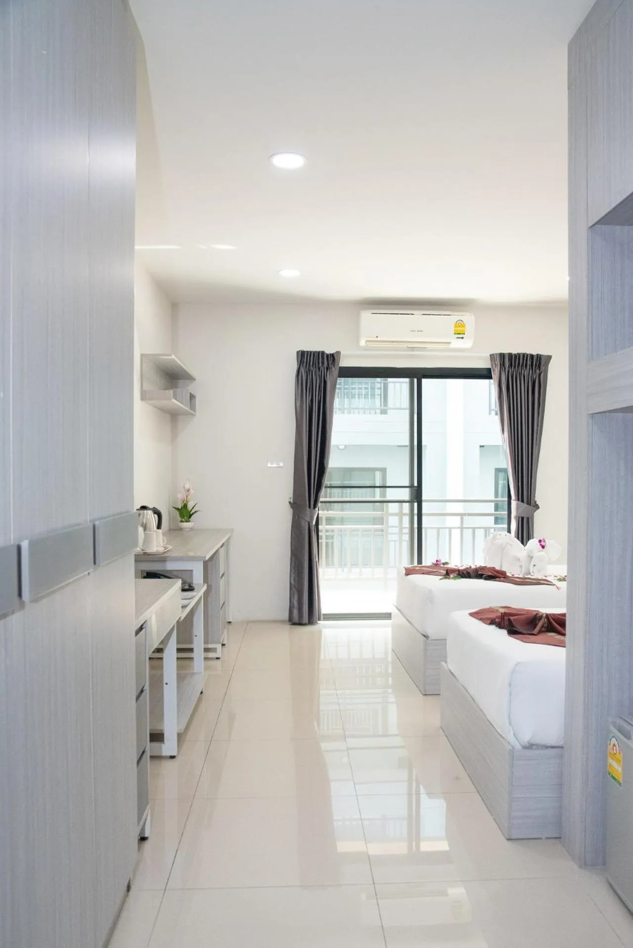 Photo of the whole room, Bed in Aurora Suvarnabhumi