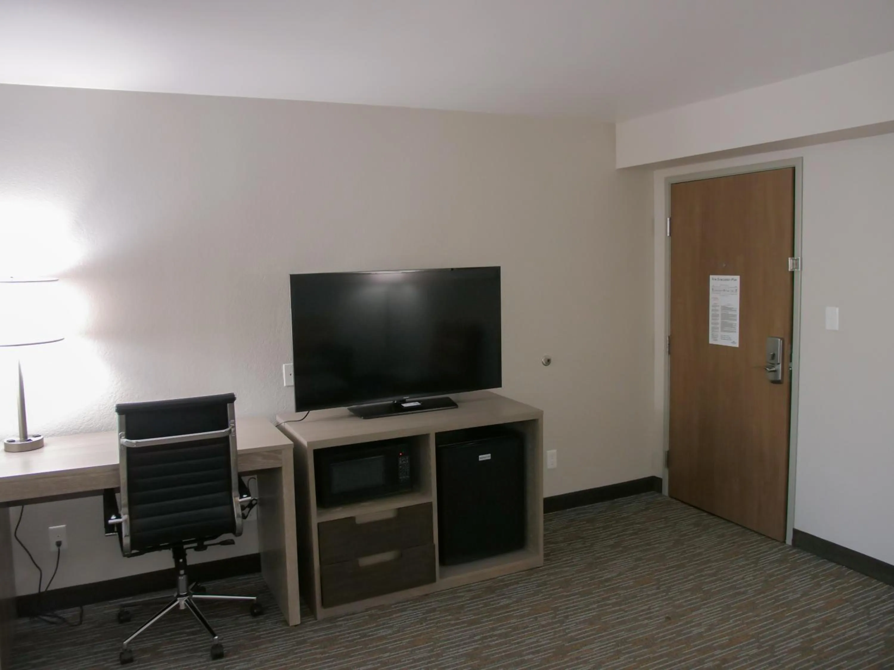 Living room in Wingate by Wyndham Louisville Airport Expo Center