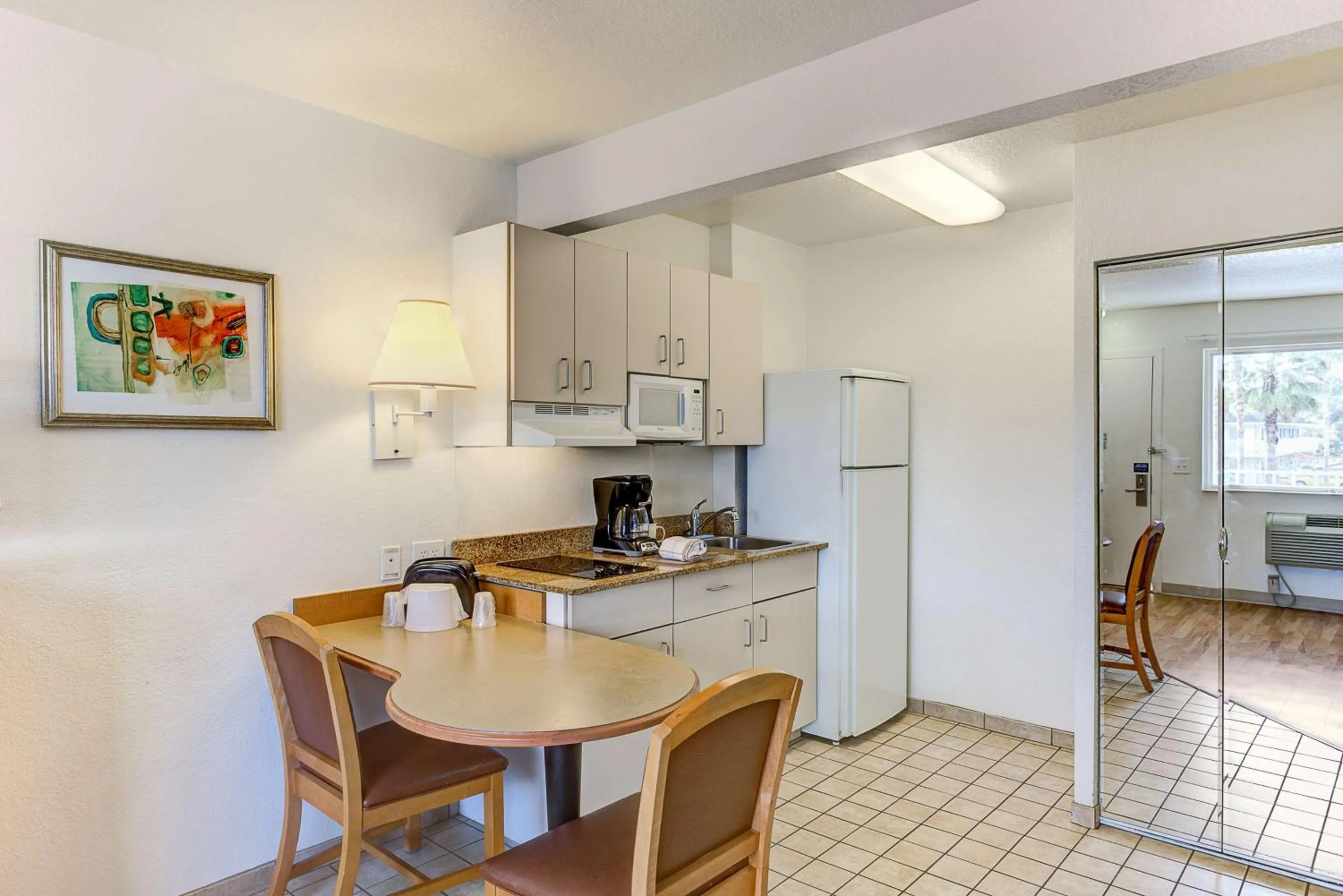 Kitchen or kitchenette in Studio 6-Kissimmee, FL - Orlando