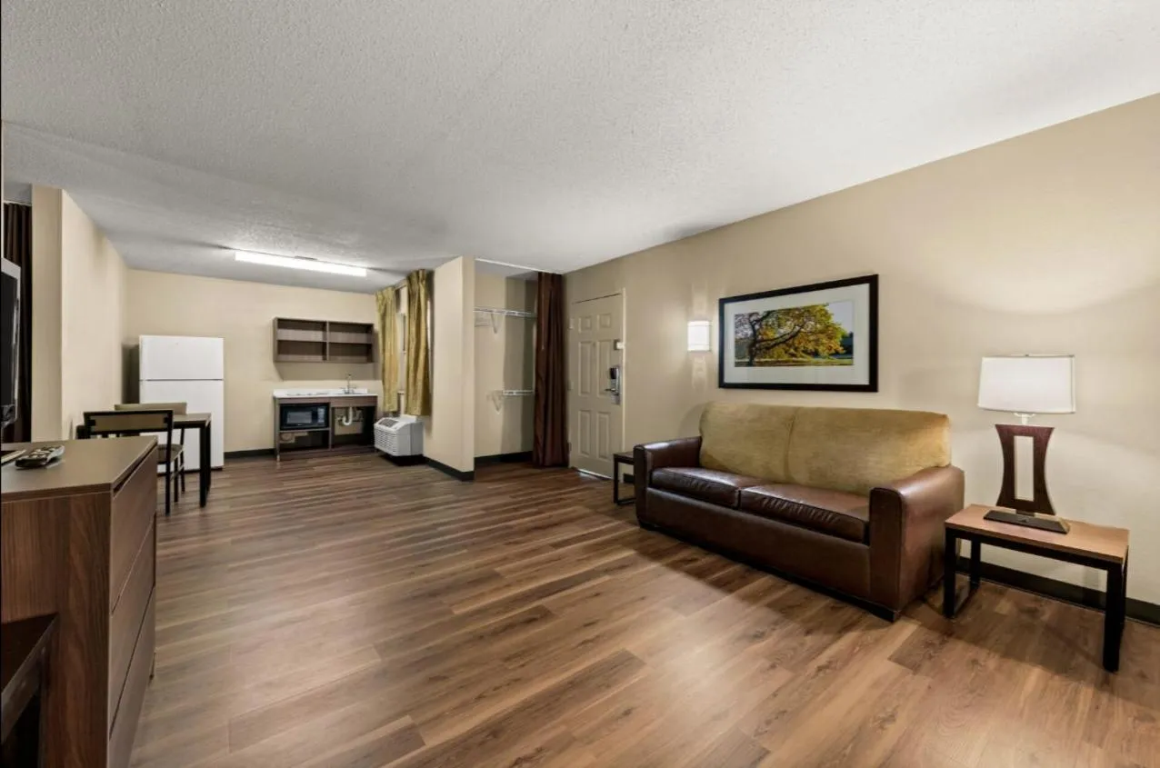 Seating area in Suburban Studios Winston-Salem near Hanes Mall