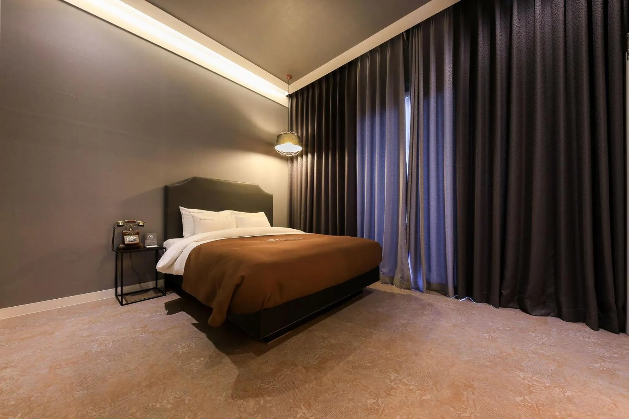 Bed in Merrymud Hotel