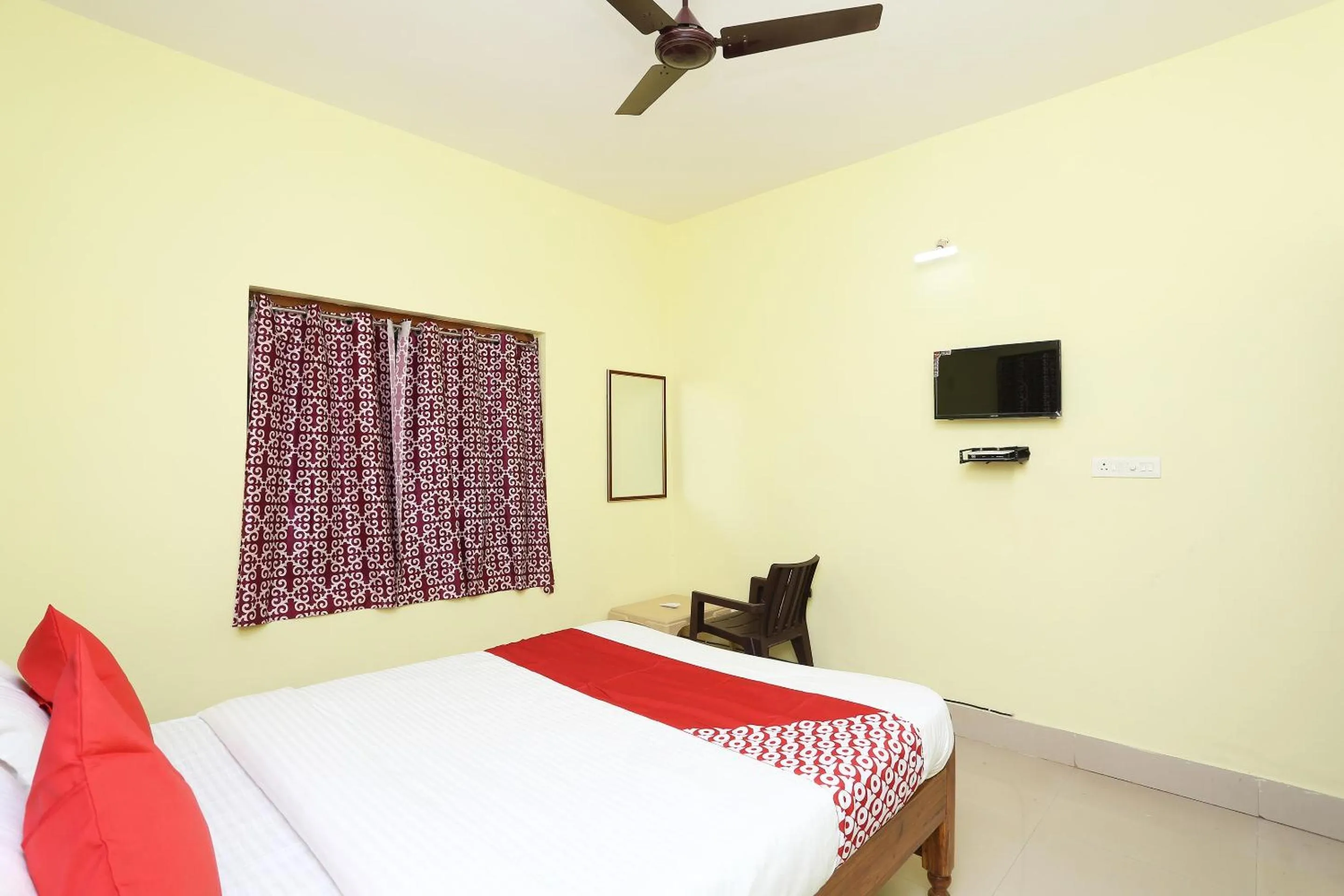 Bedroom in Hotel O Nandan Residency