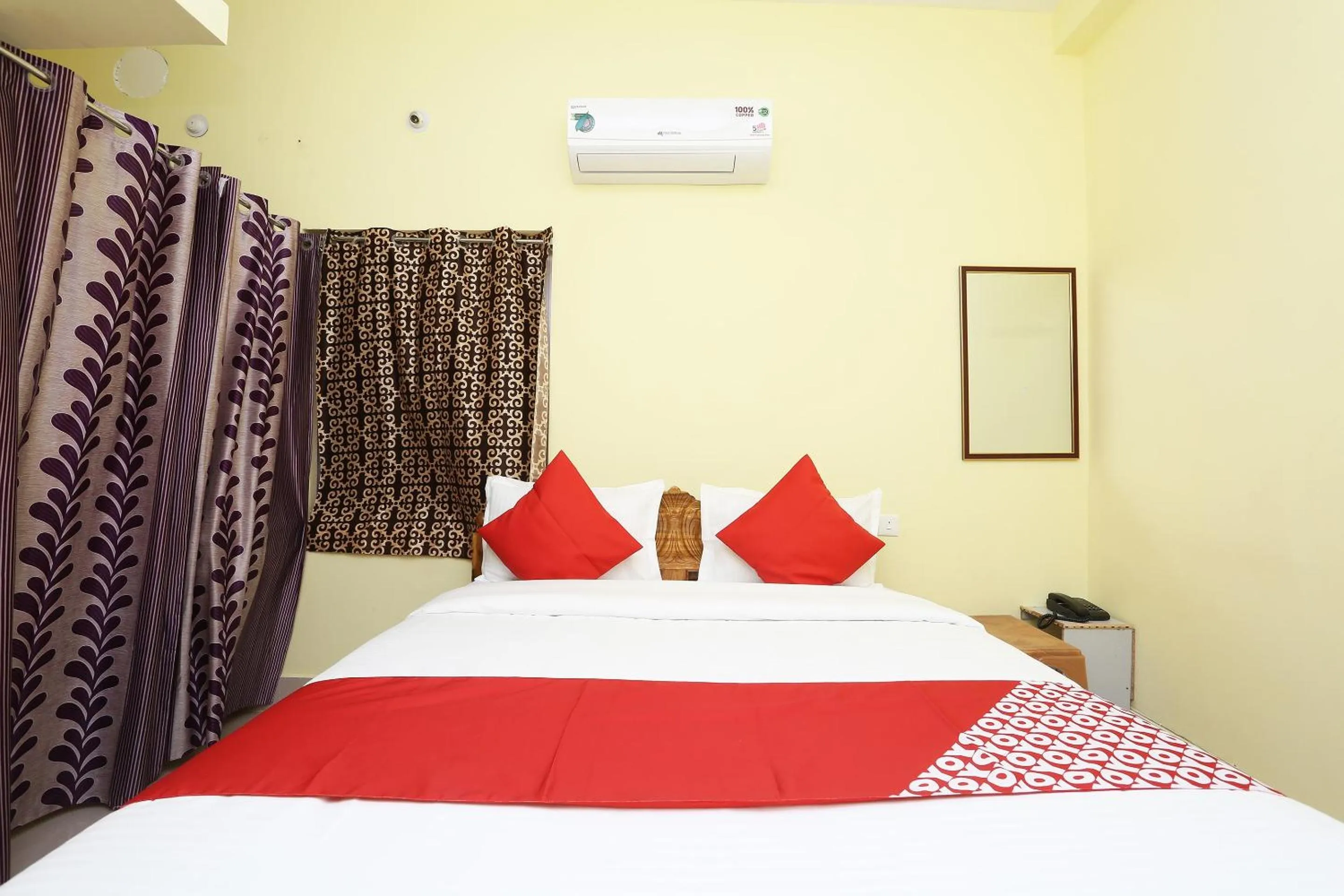 Bedroom in Hotel O Nandan Residency