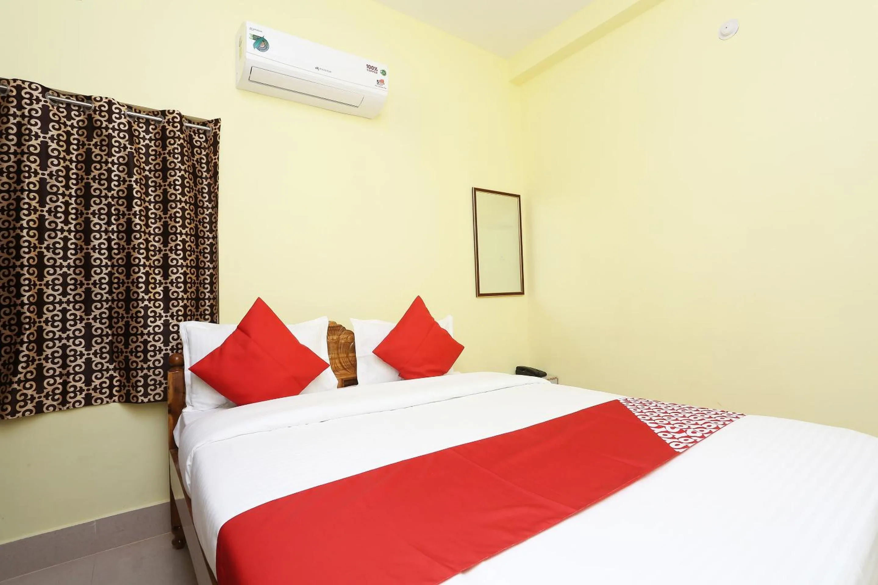 Bedroom in Hotel O Nandan Residency