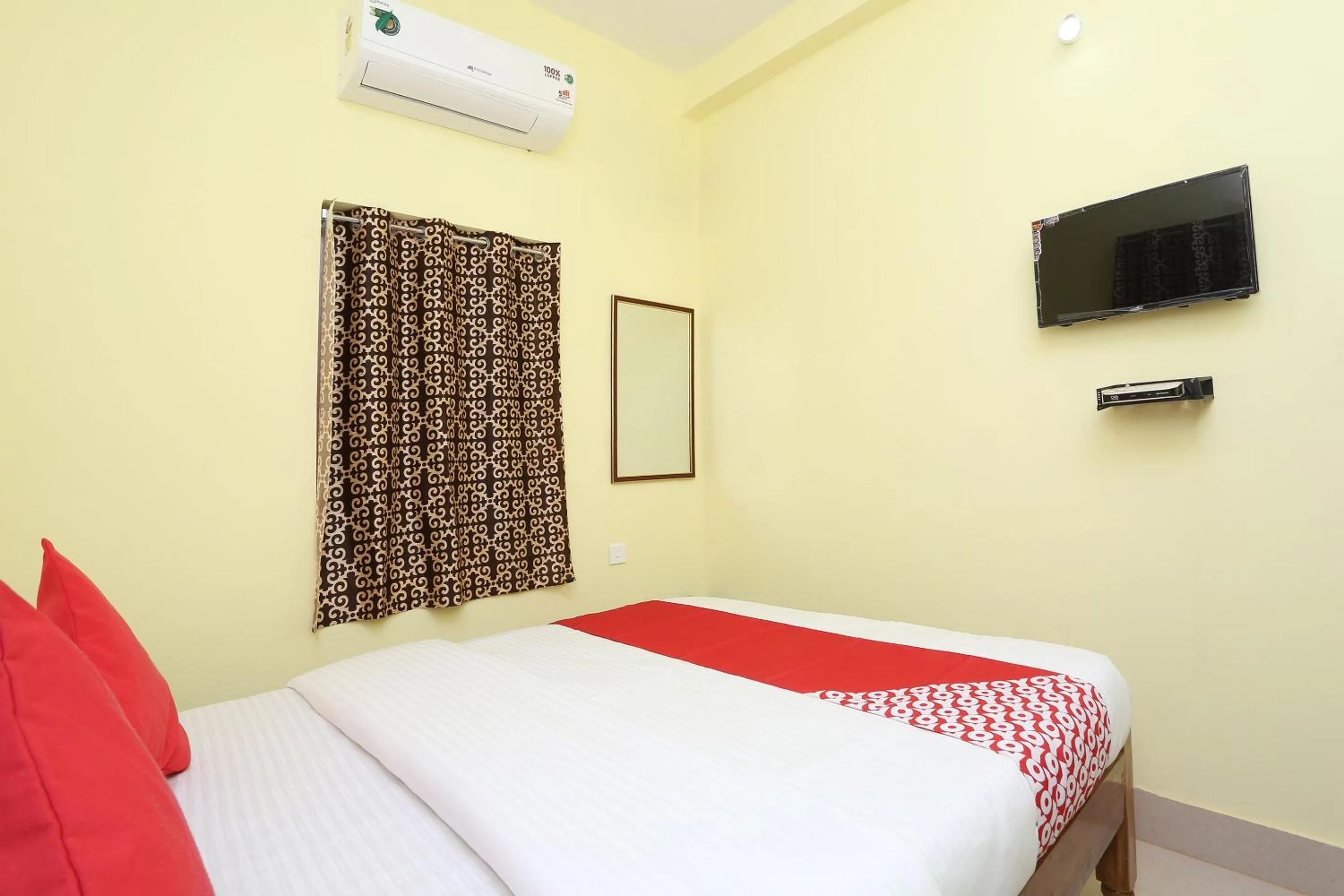 Bedroom in Hotel O Nandan Residency