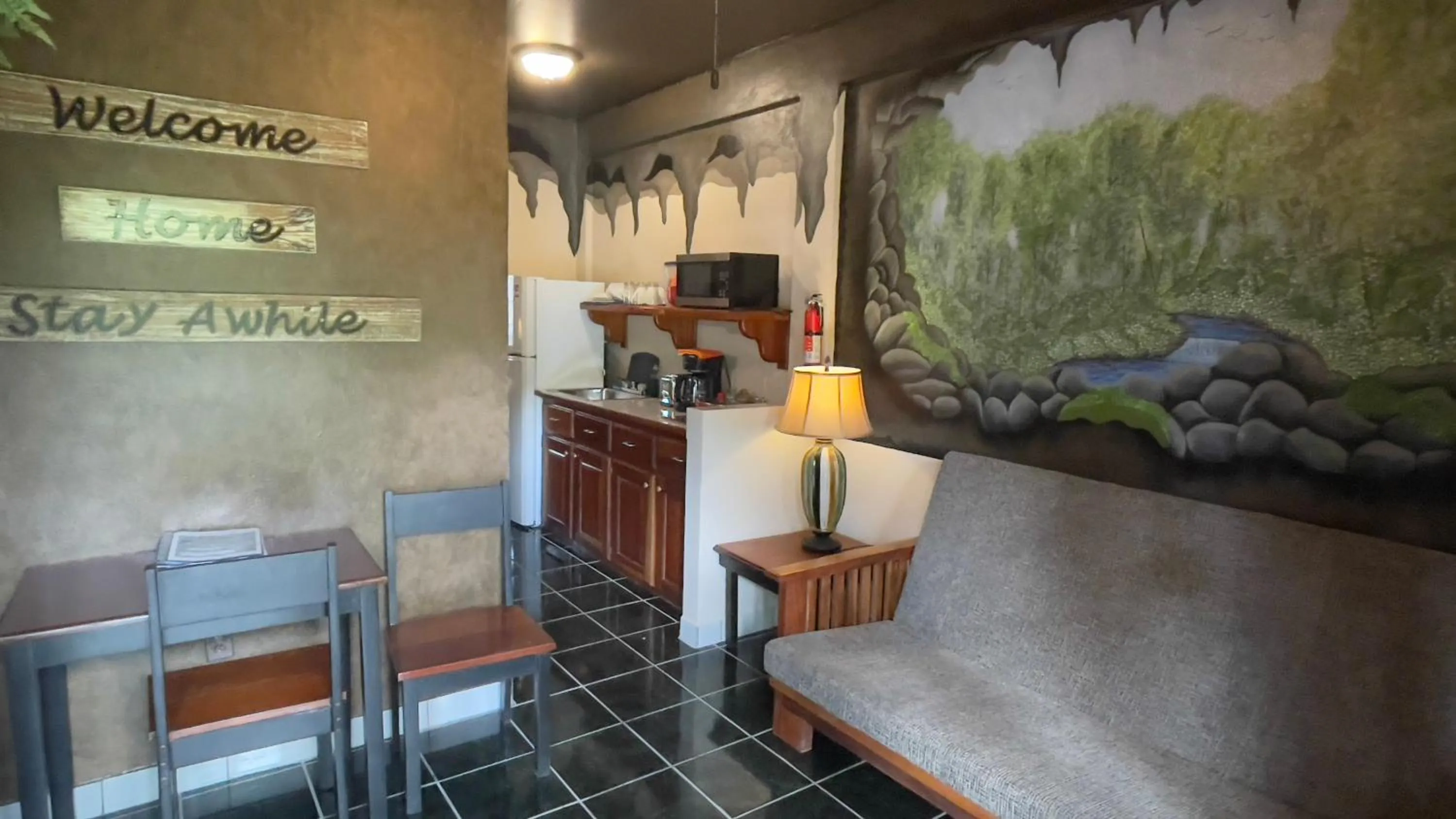 Living room in Belize Budget Suites