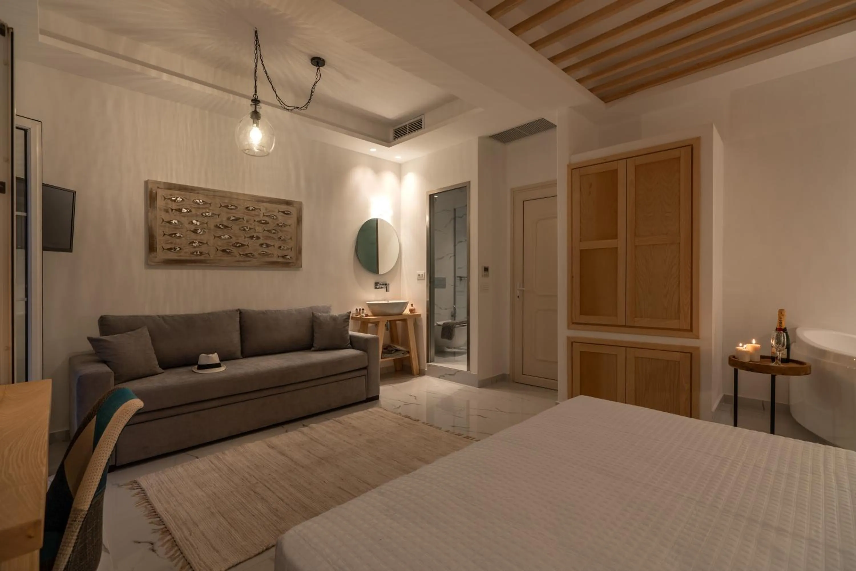 Seating area, Bed in Central Suites Mykonos