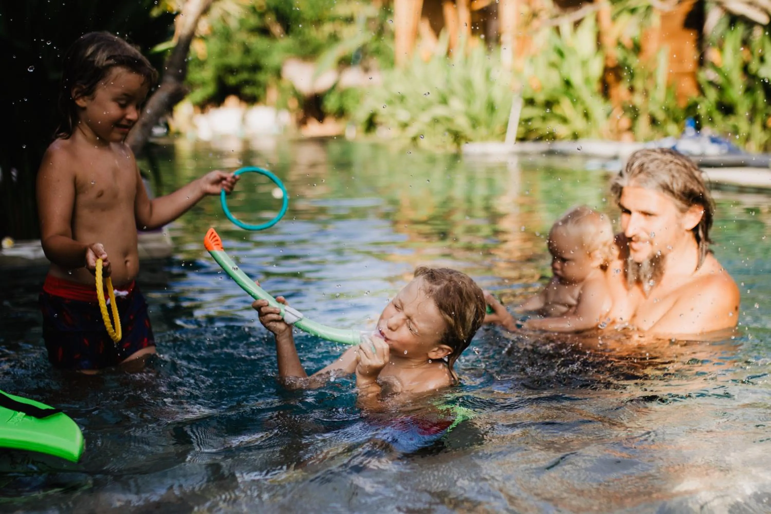 People in Kalyssa Beach Bungalows