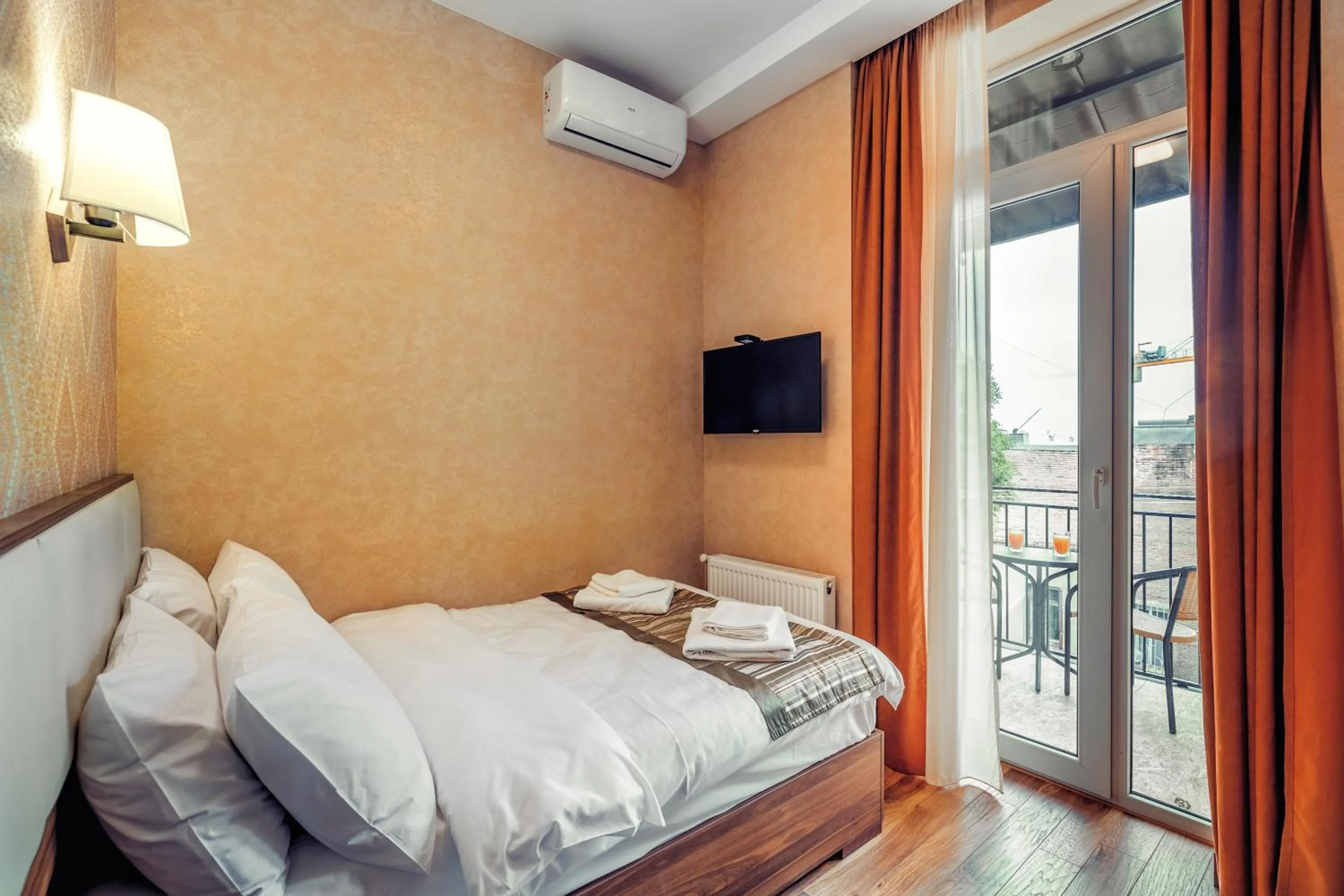 Bed in Ornament Hotel