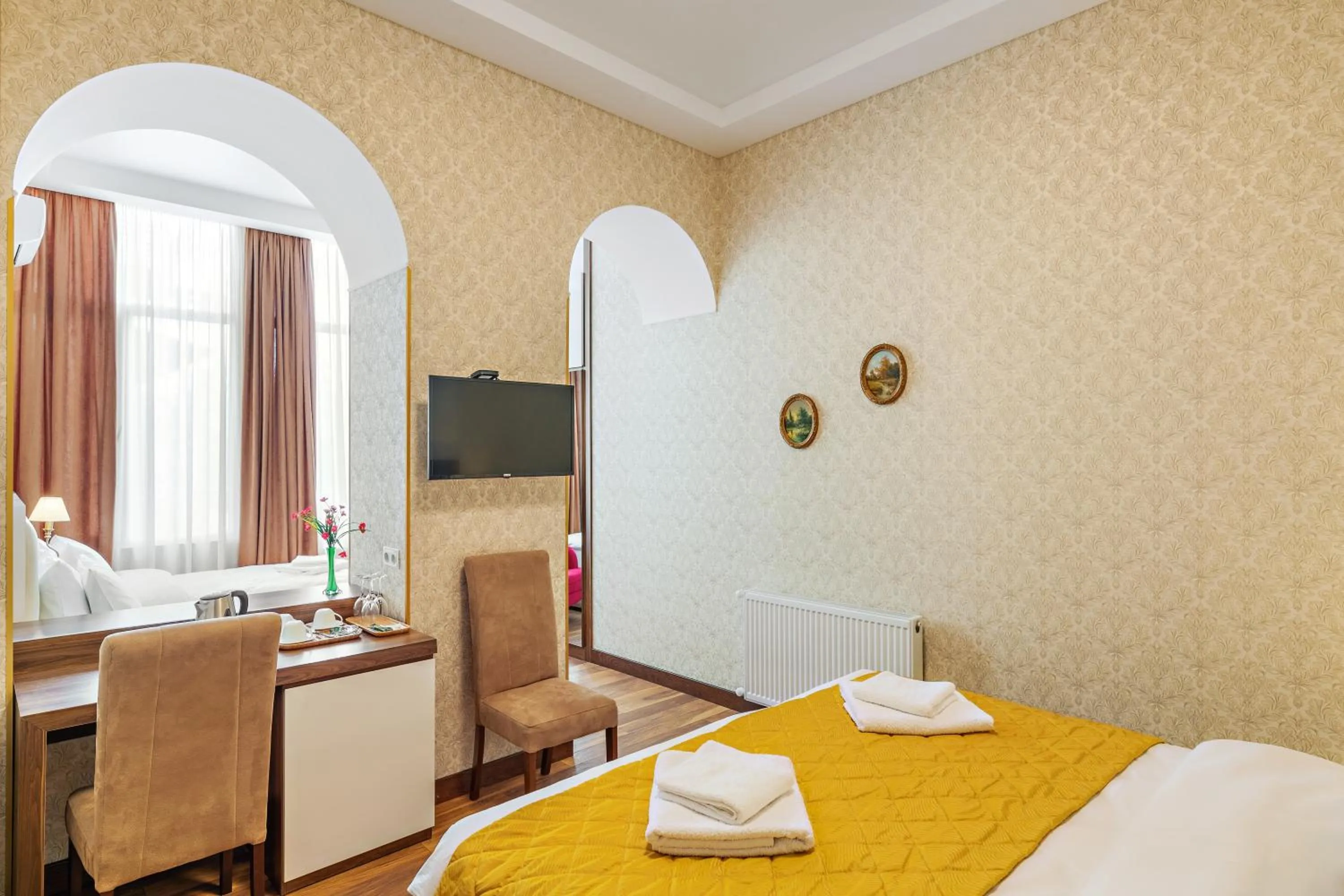 Bed in Ornament Hotel