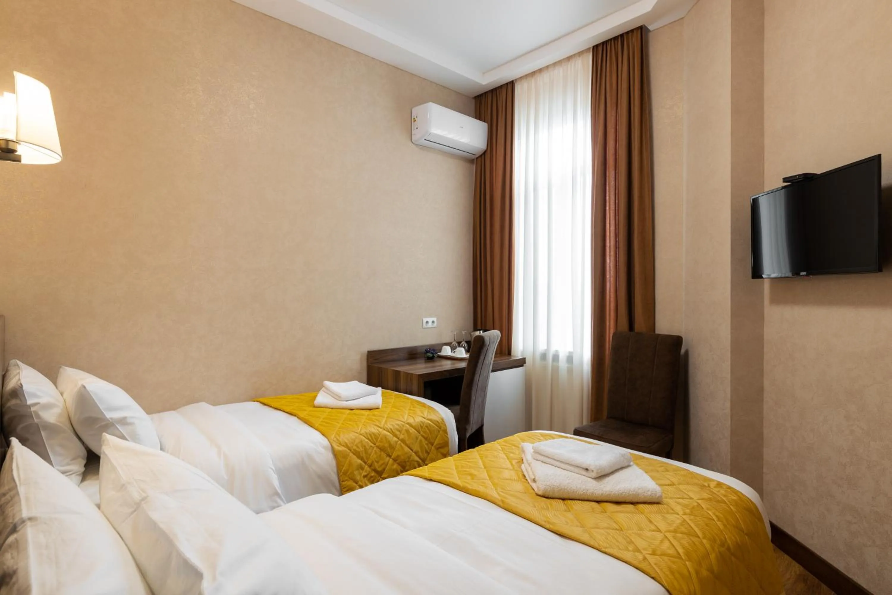 Bed in Ornament Hotel