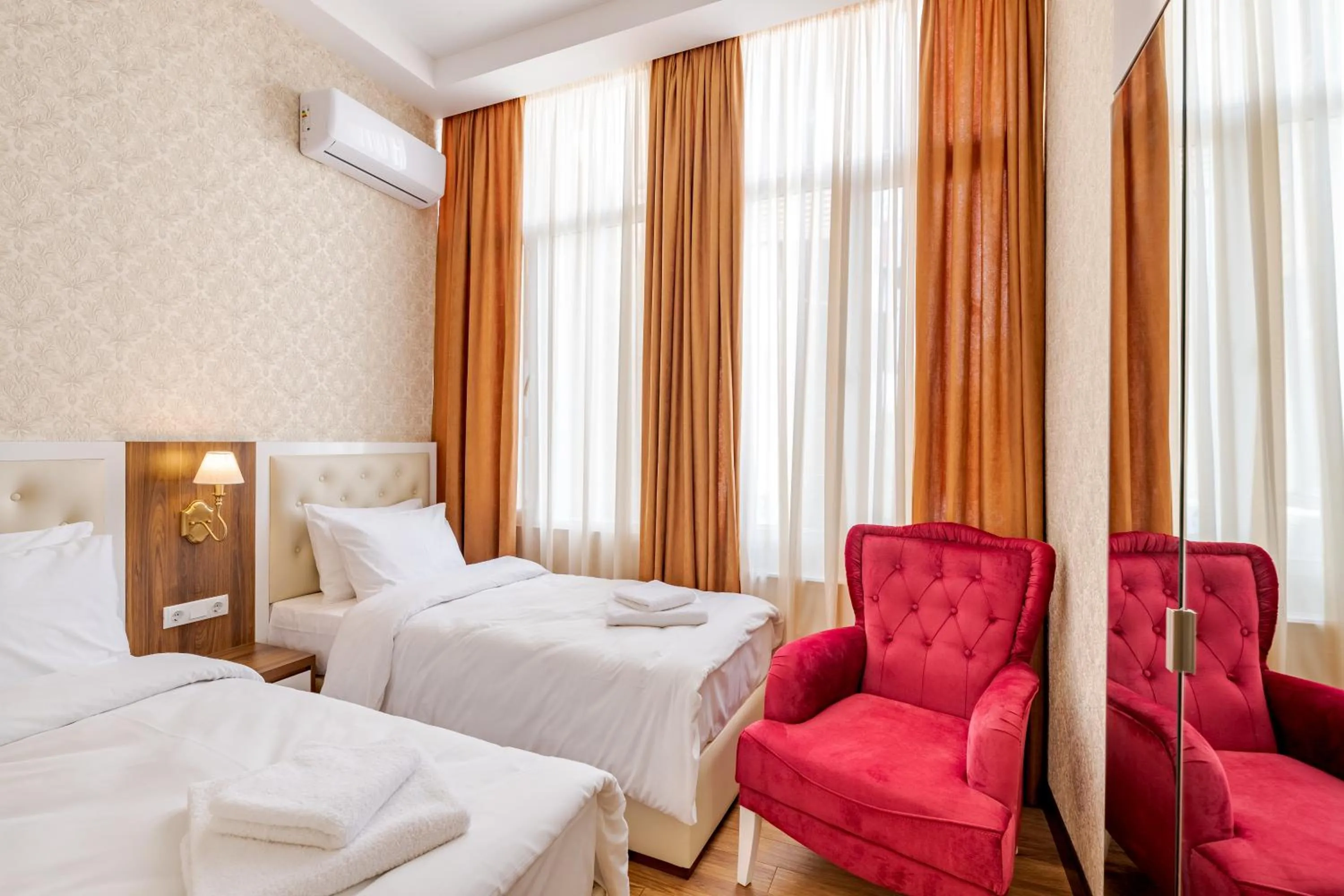 Bed in Ornament Hotel