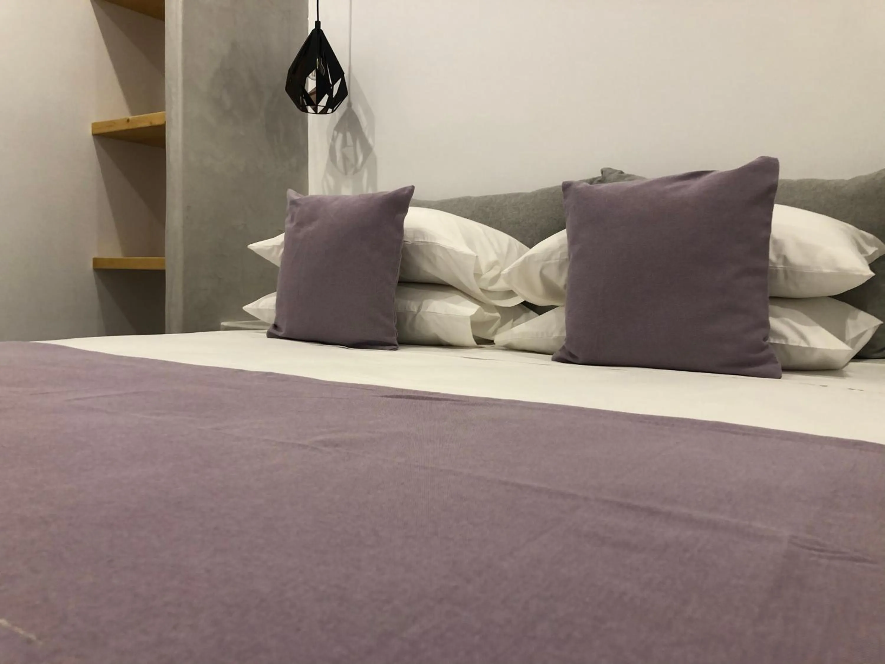 Bed in Dragonfly Villas