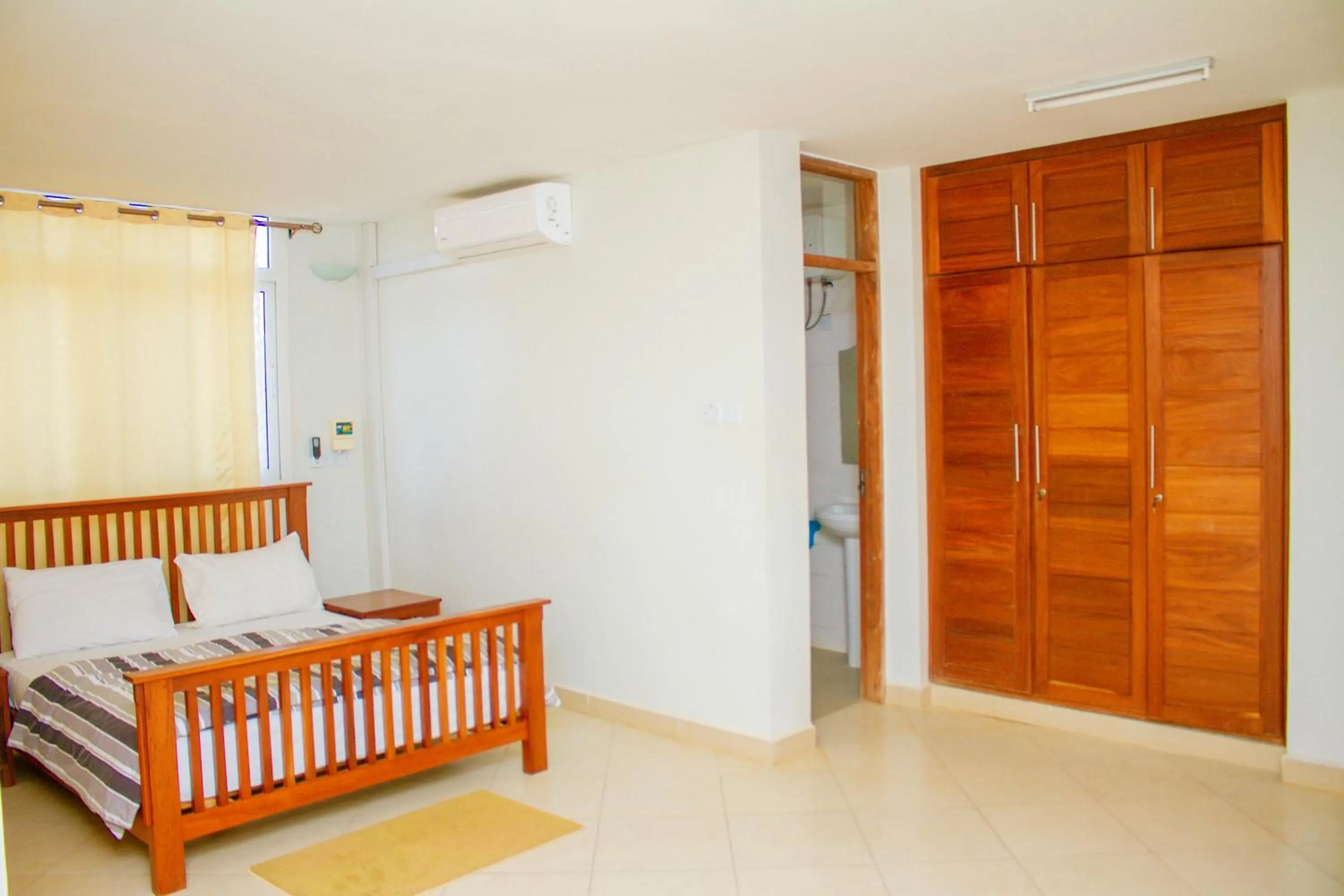 Bedroom in Ambiere House