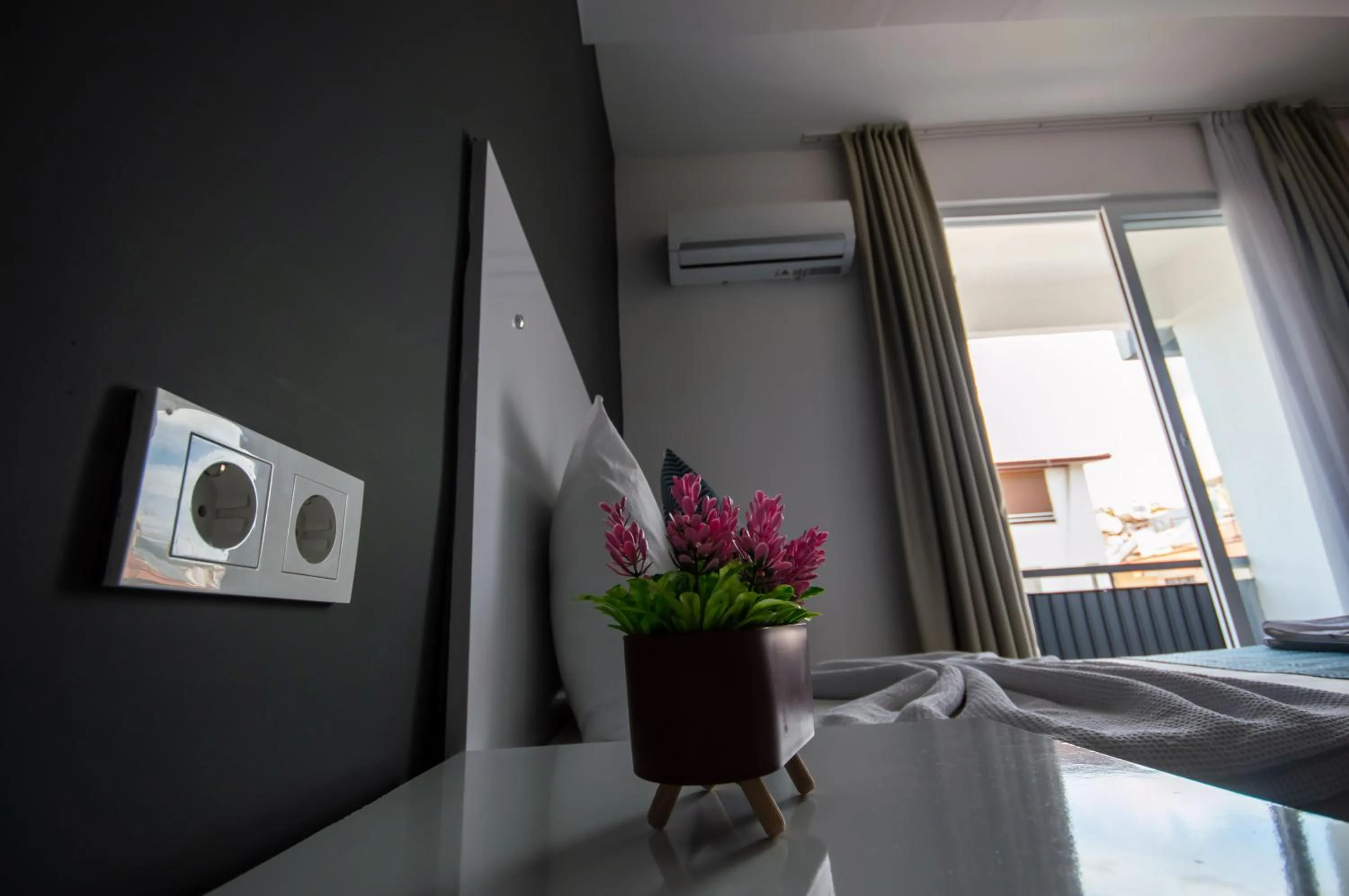 Bed in MOONBOW BEACH HOTEL