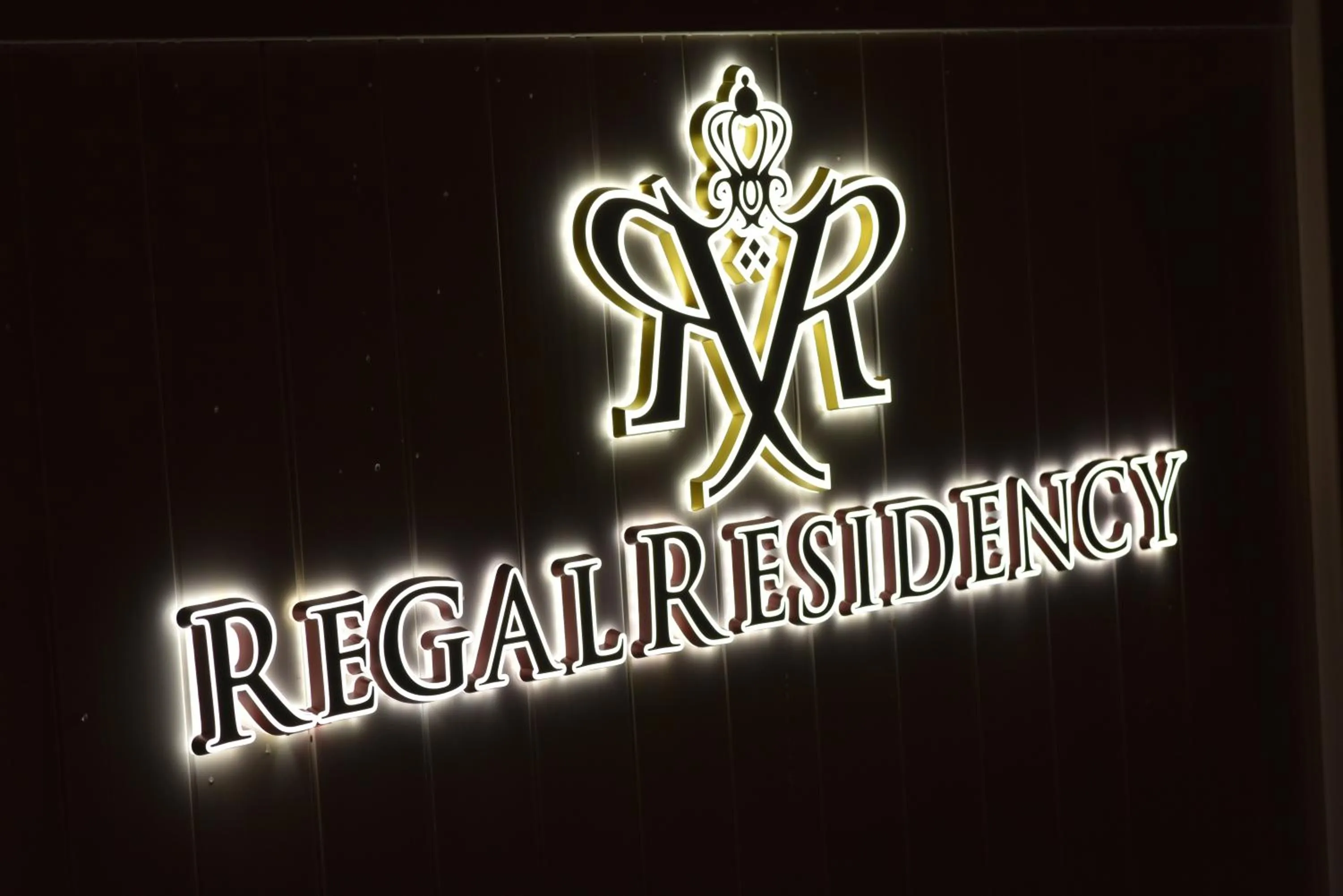 Property logo or sign in Regal Residency