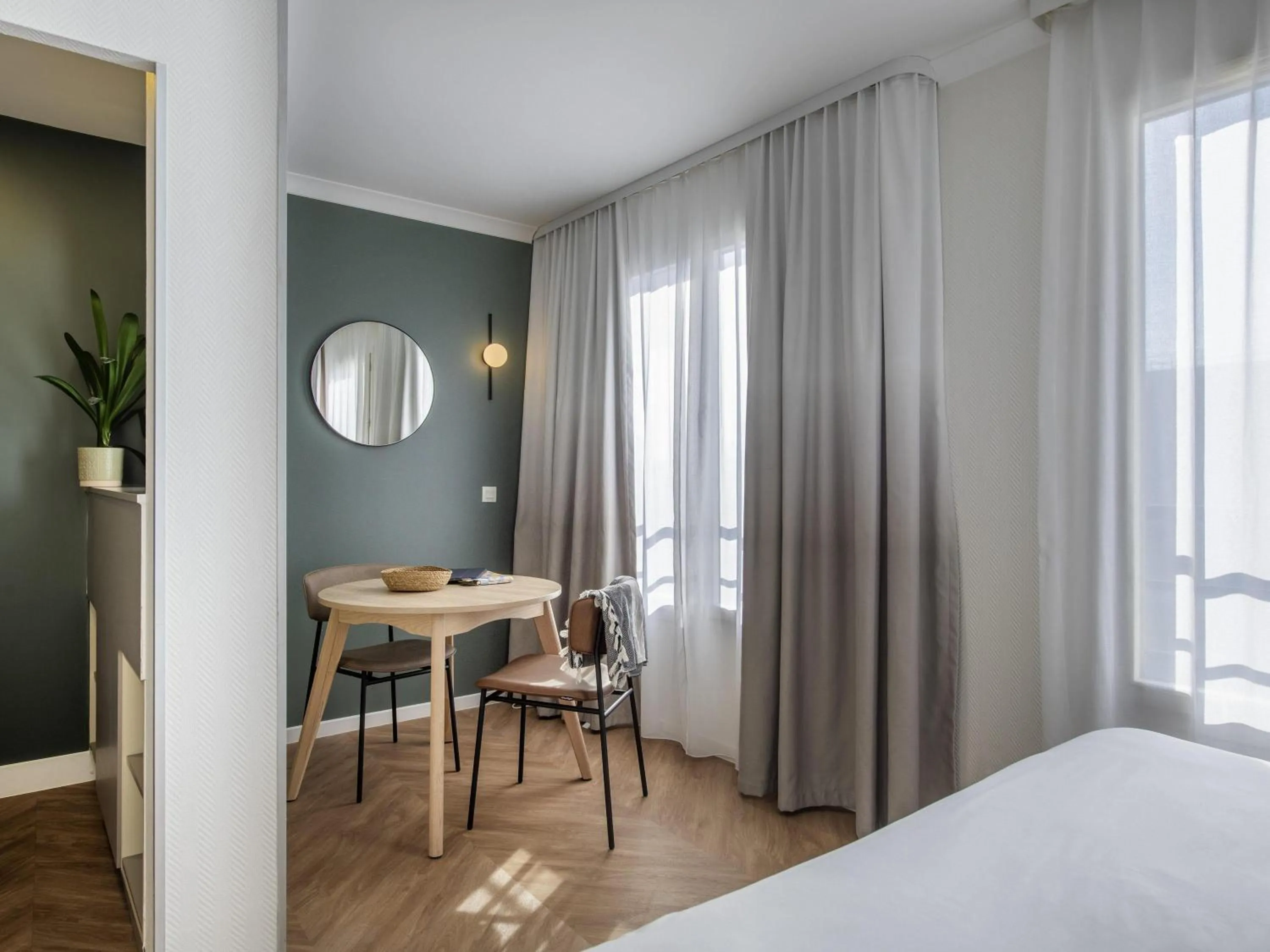 Bedroom, Bed in Aparthotel Adagio Paris Buttes Chaumont