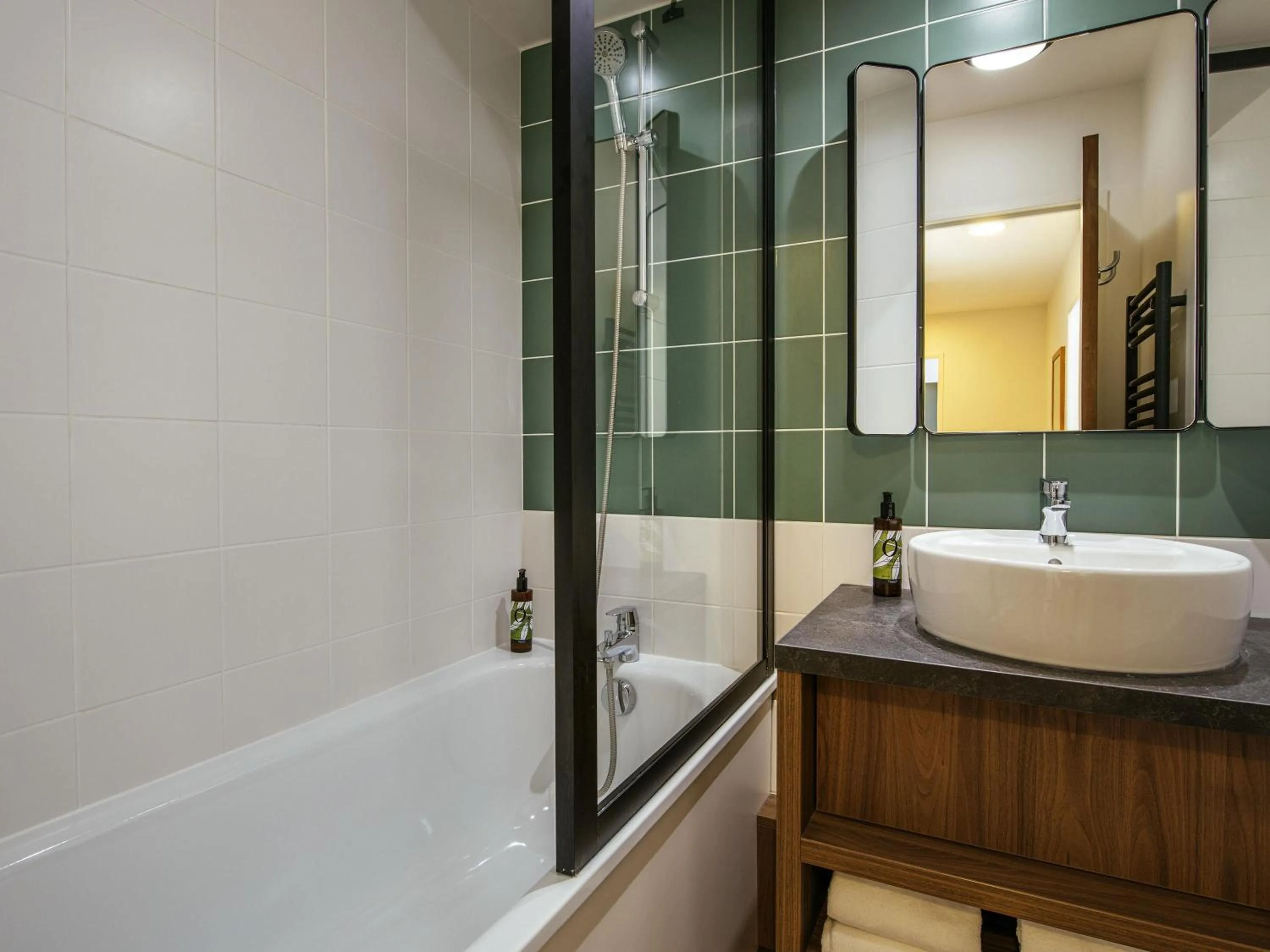 Bedroom in Aparthotel Adagio Paris Buttes Chaumont