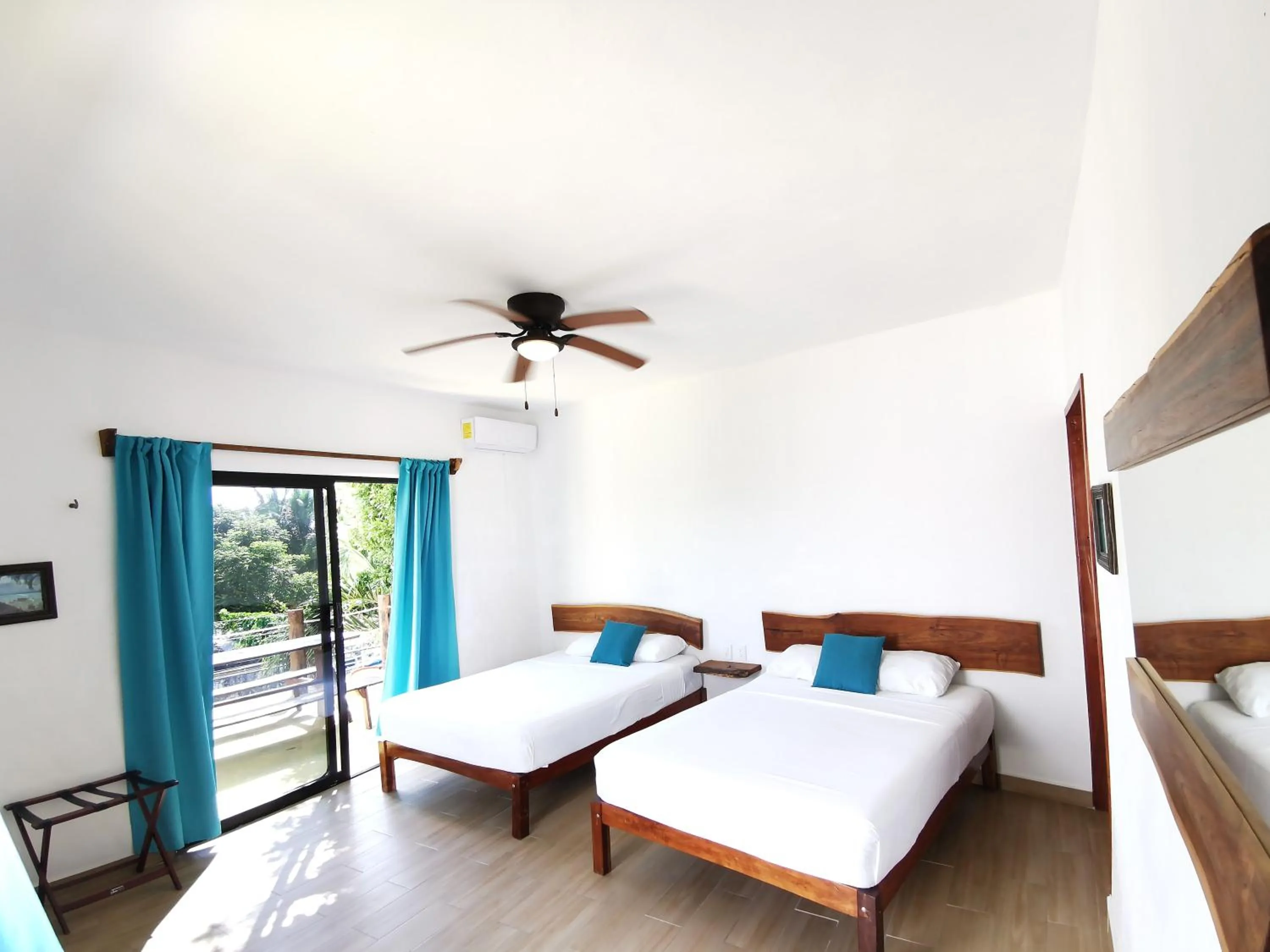 Bed in Ade Hotel Bacalar