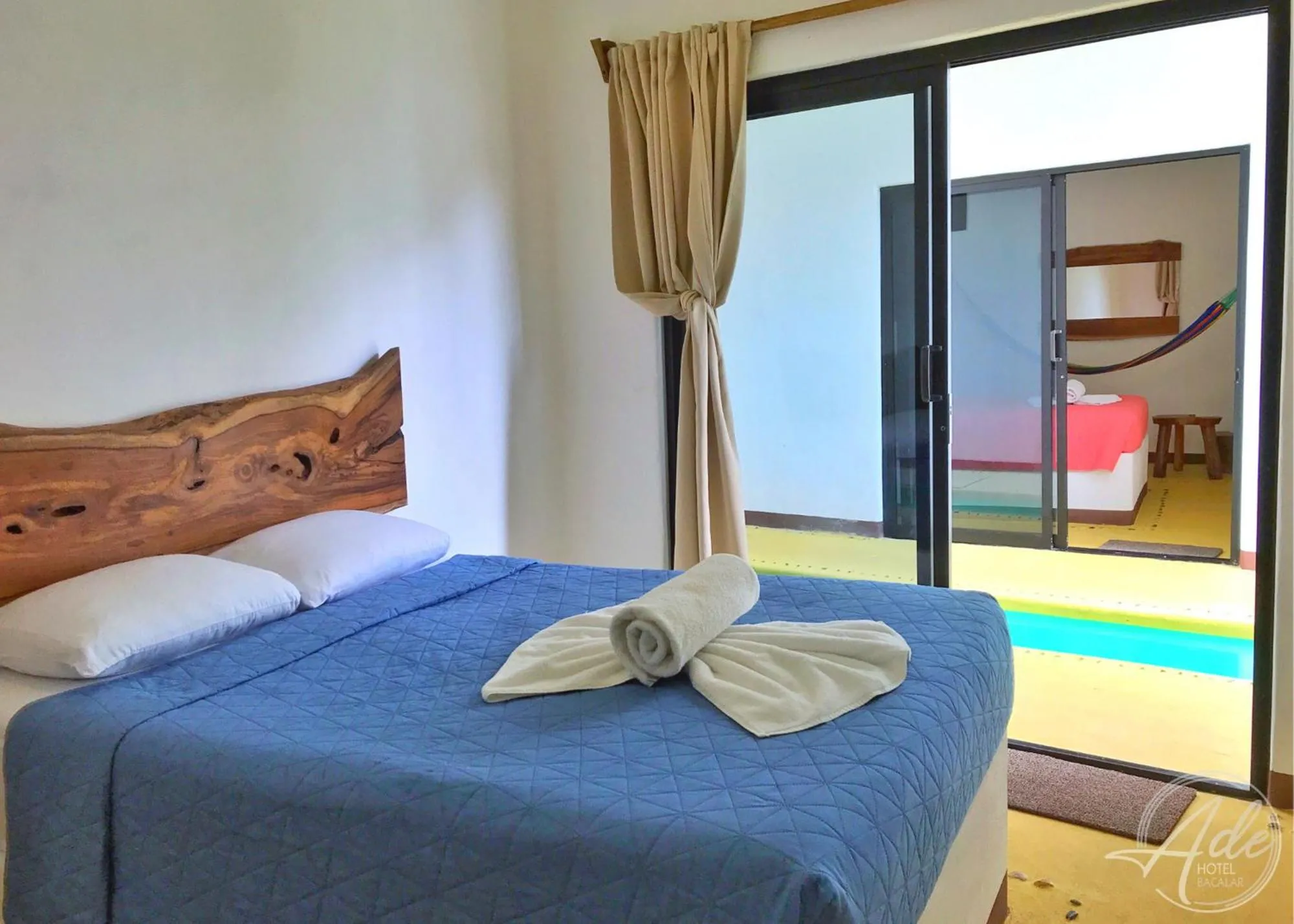 Bed in Ade Hotel Bacalar