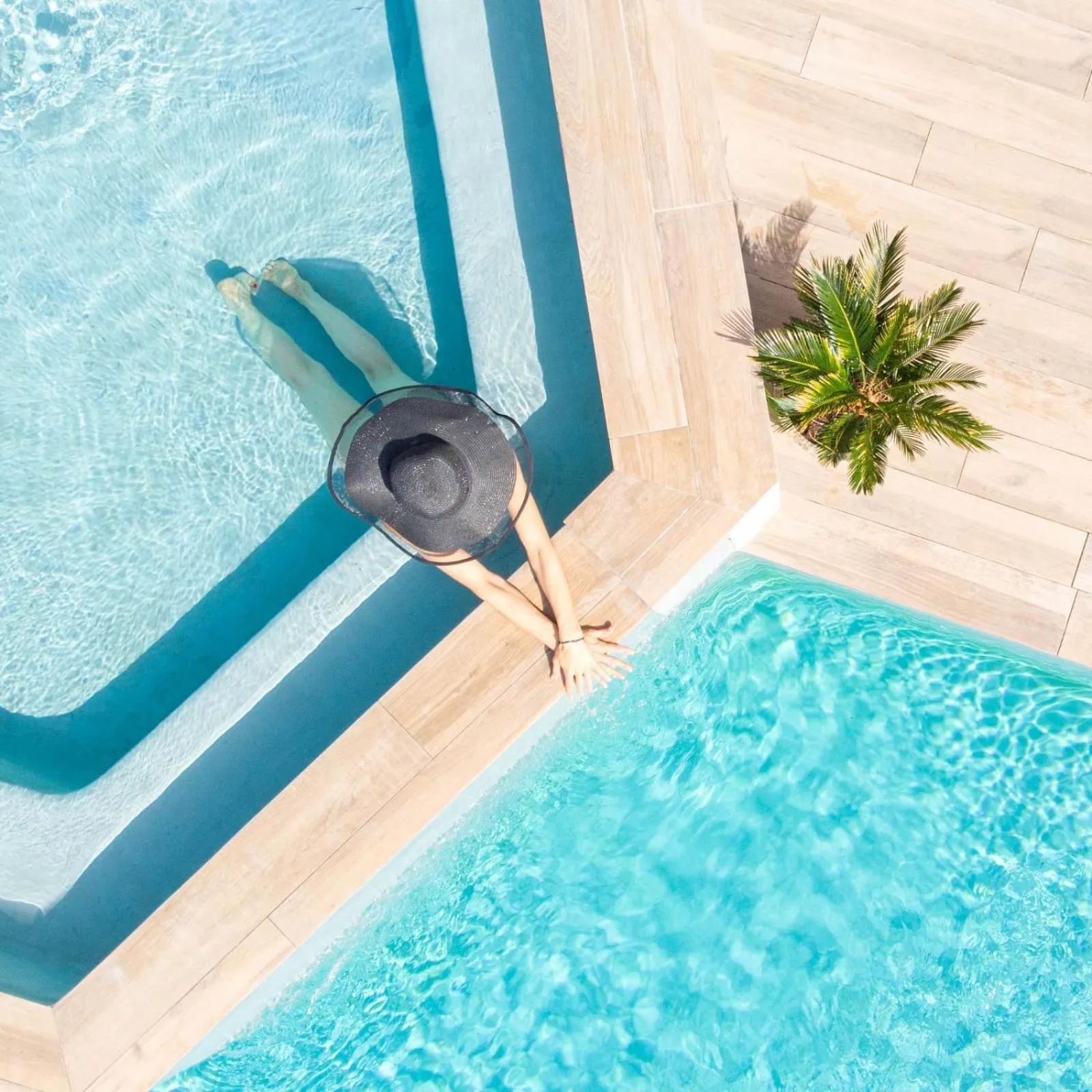 Swimming pool in Le Confidentiel Hôtel & SPA