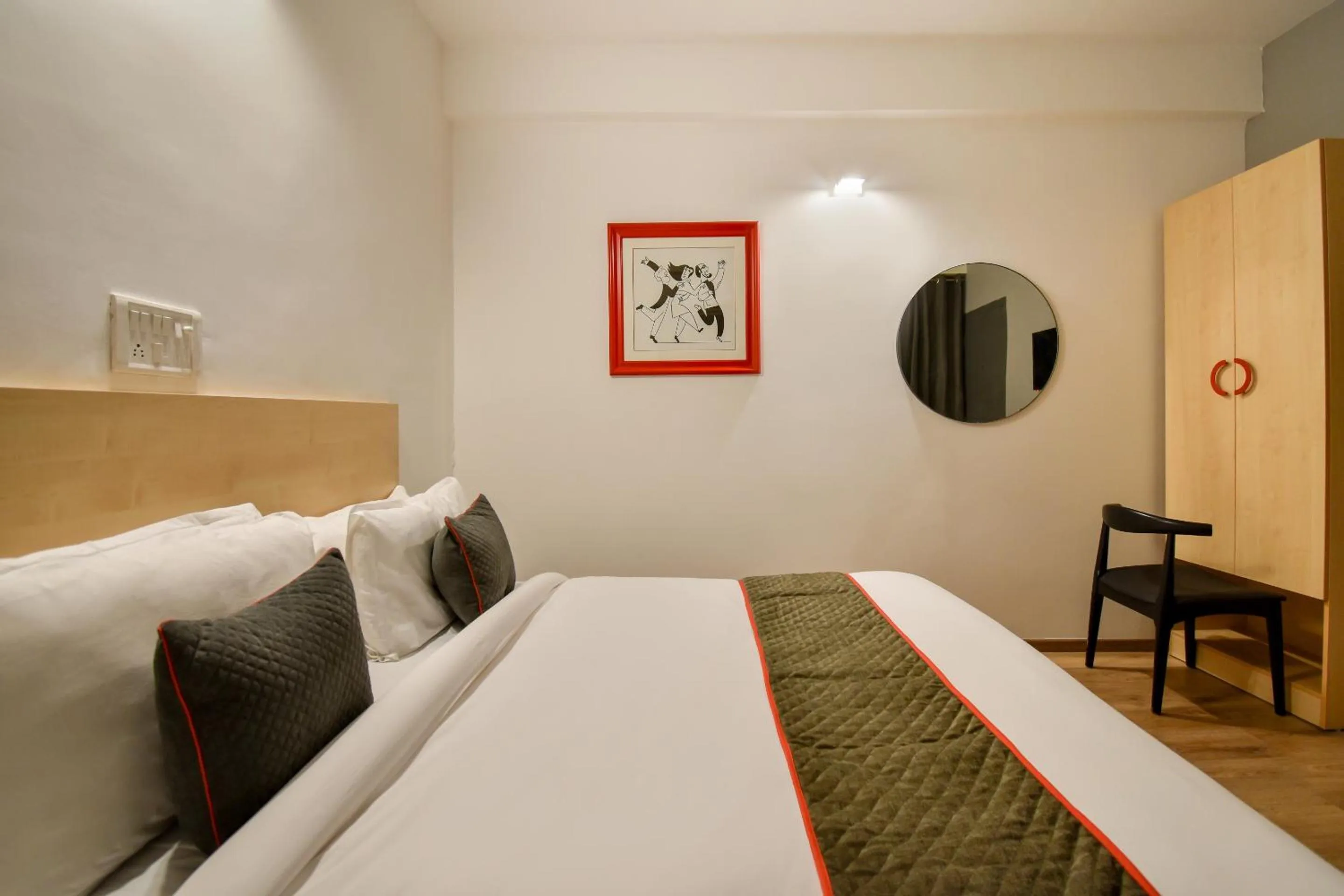 Bedroom in OYO Hotel Luxurs