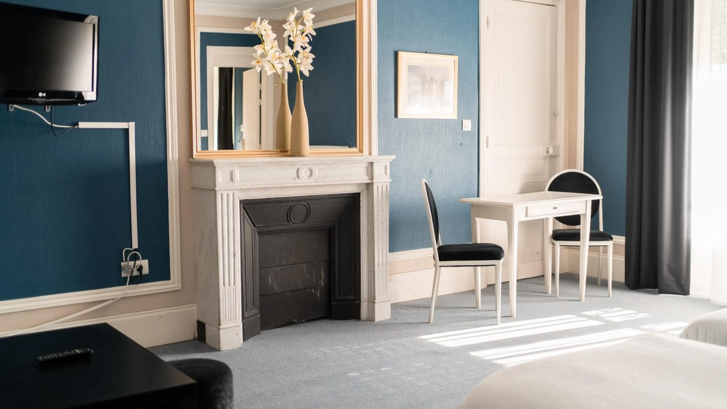 Living room in Hôtel Cosmos & Spa