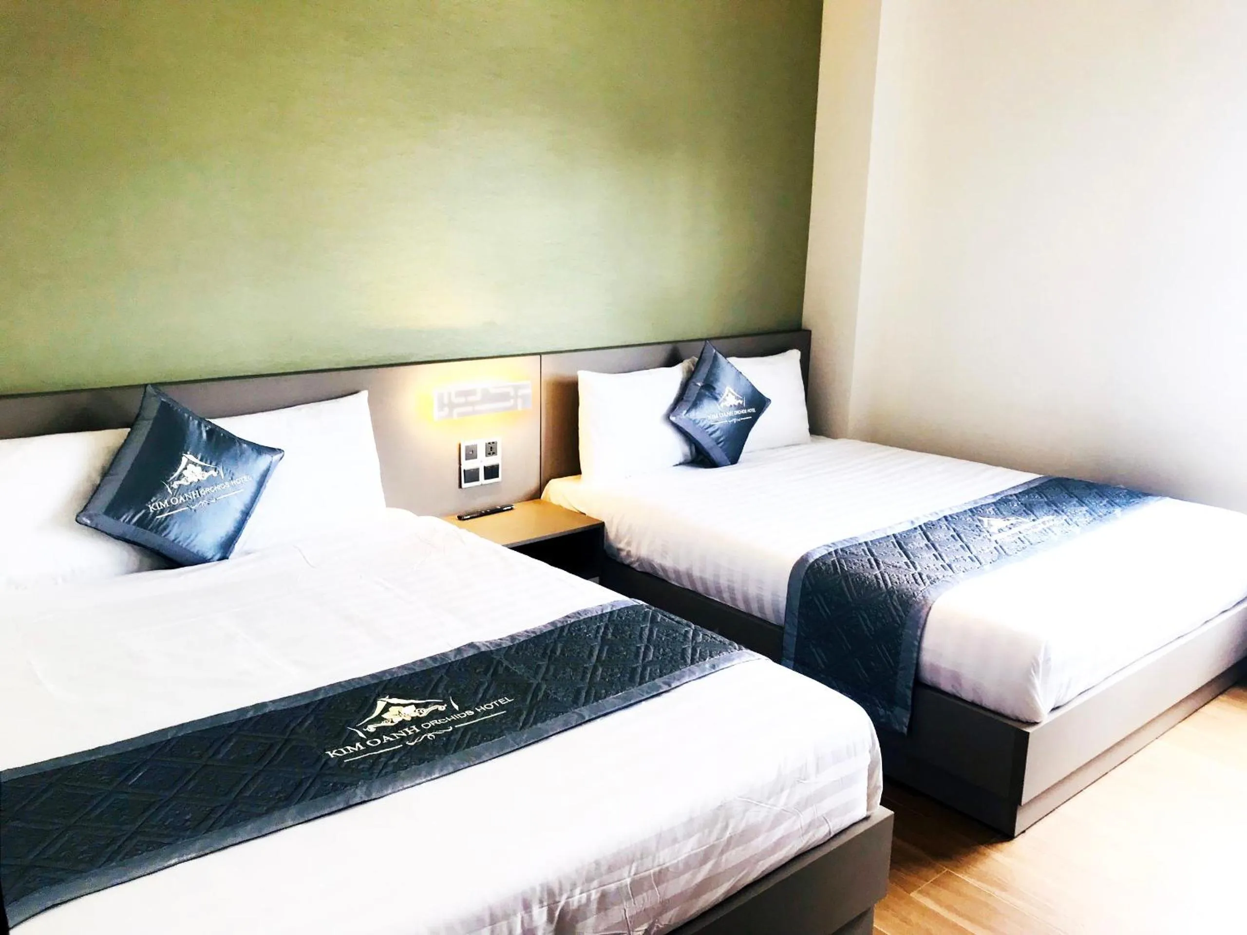 Bed in Kim Oanh Orchids Hotel