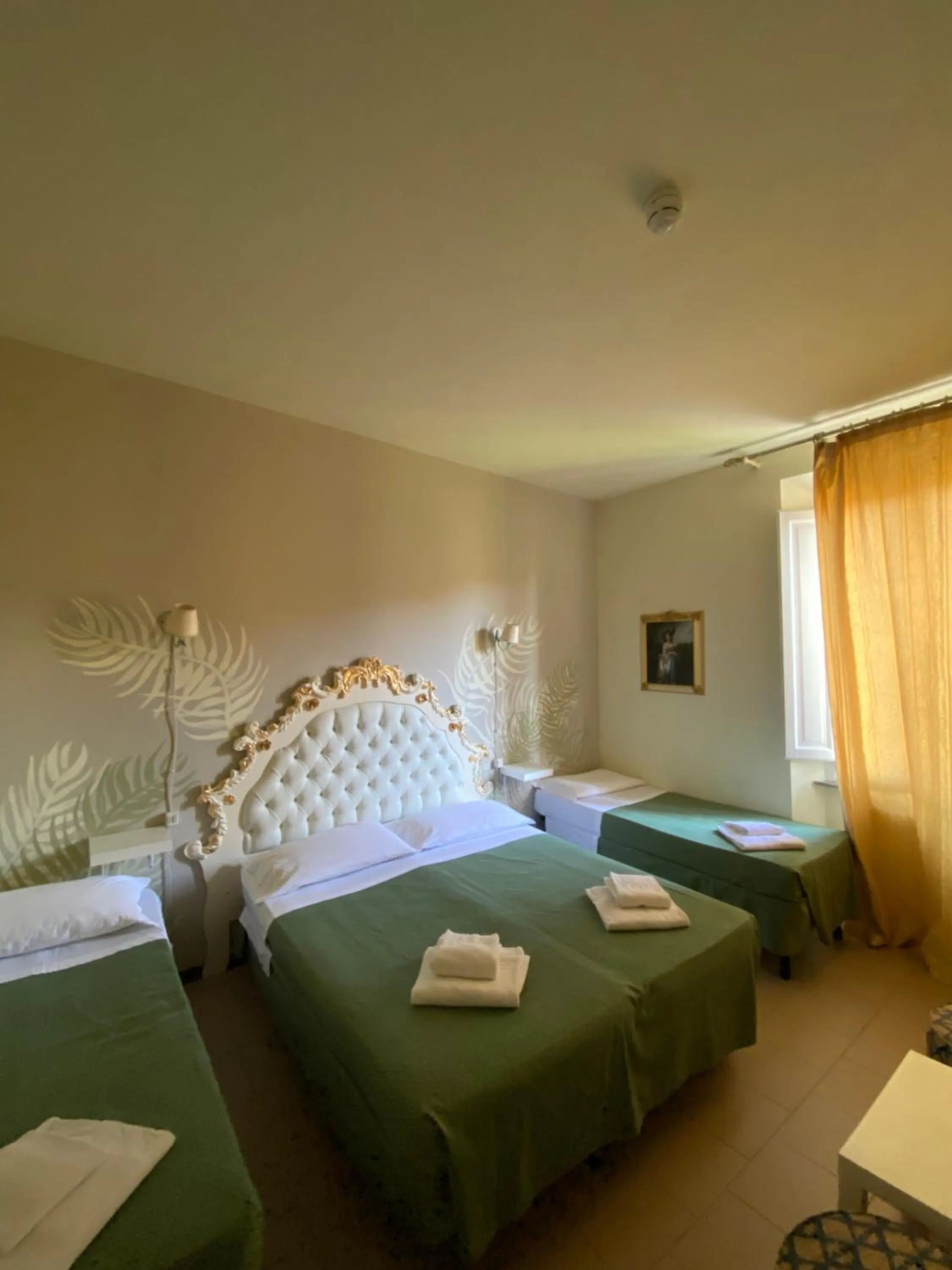 Bed in HOTEL RINASCIMENTO