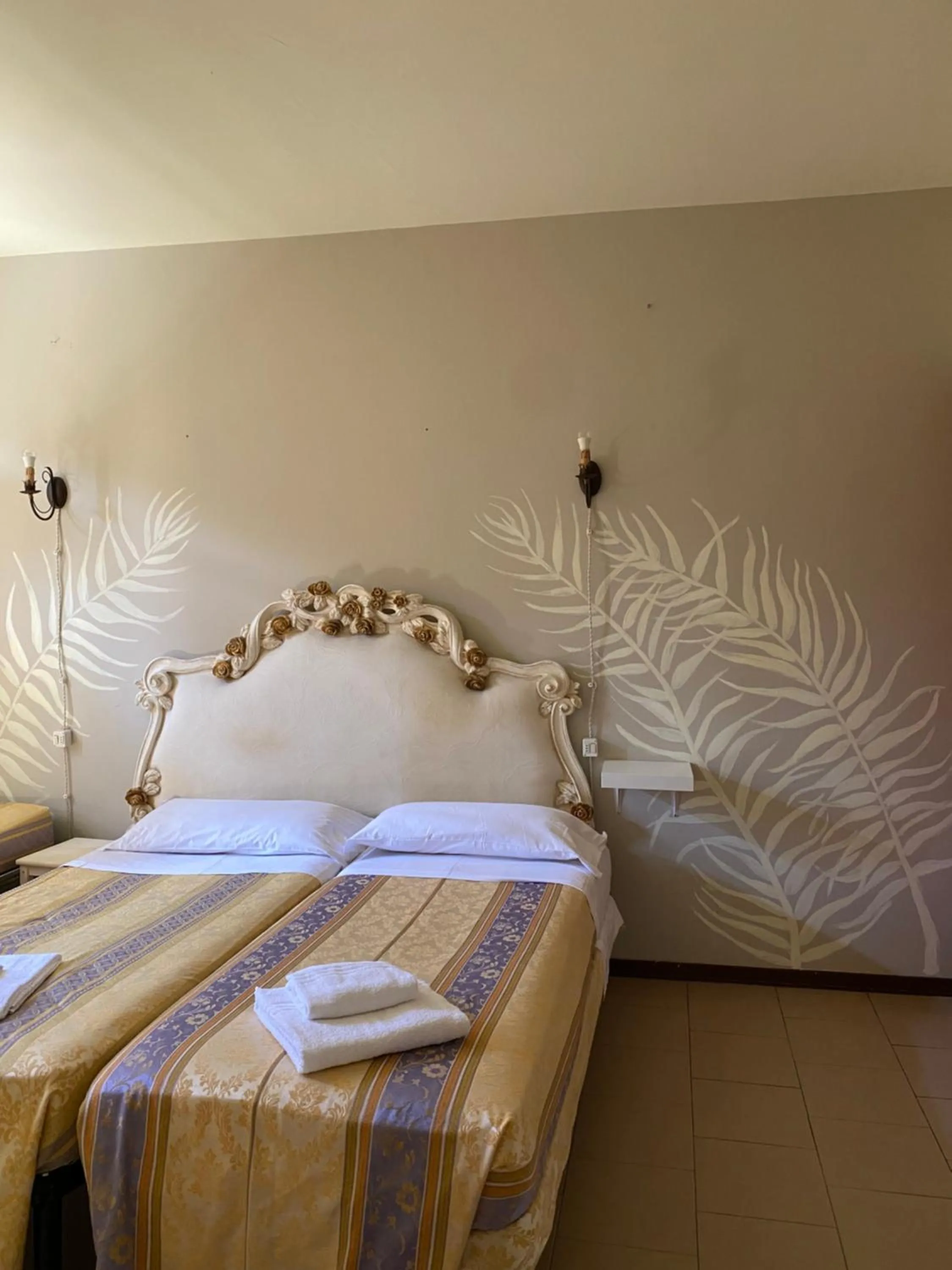 Bed in HOTEL RINASCIMENTO